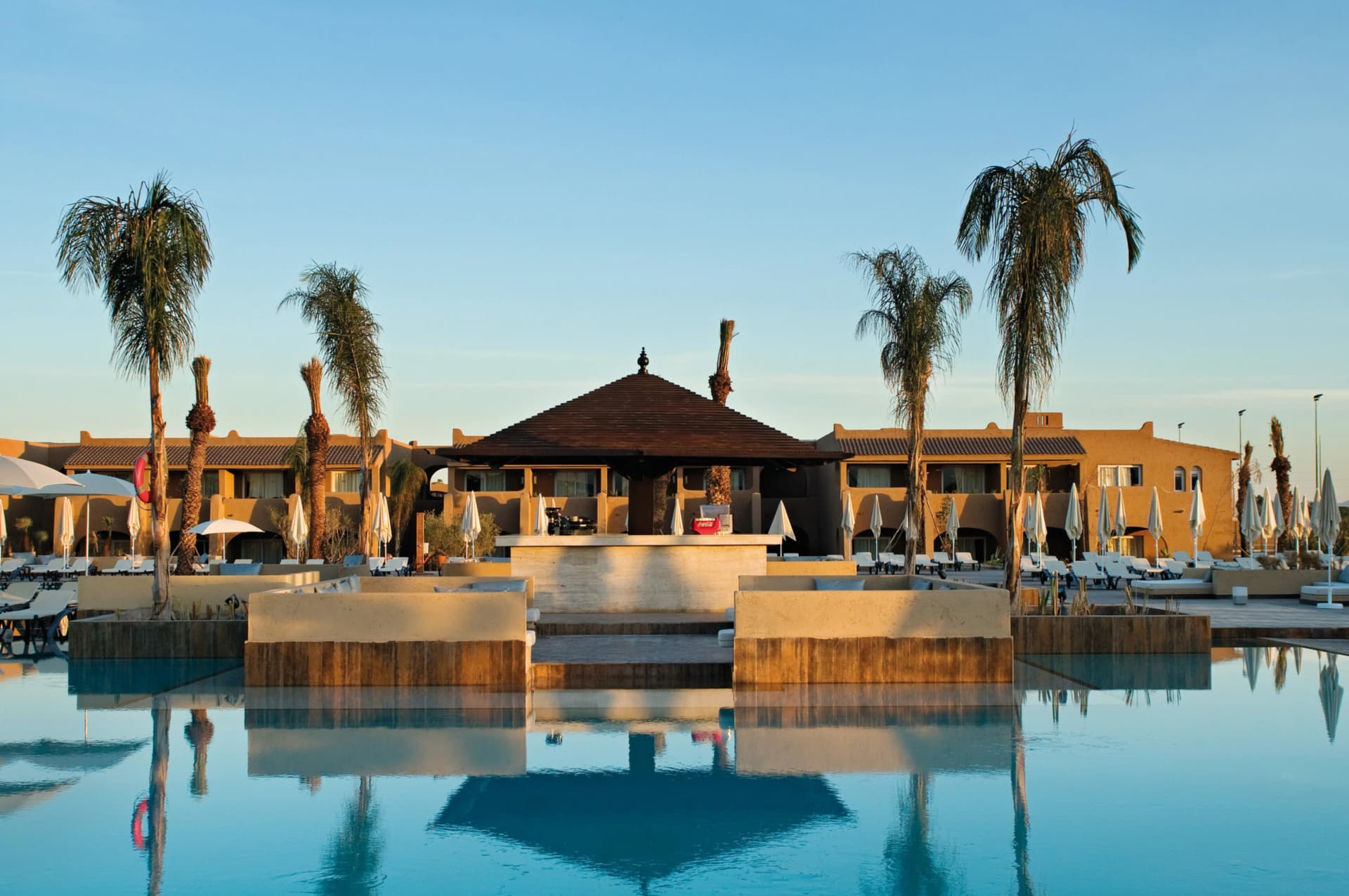 Panoramic view of the outdoor pool at Clubhotel Riu Tikida Palmeraie