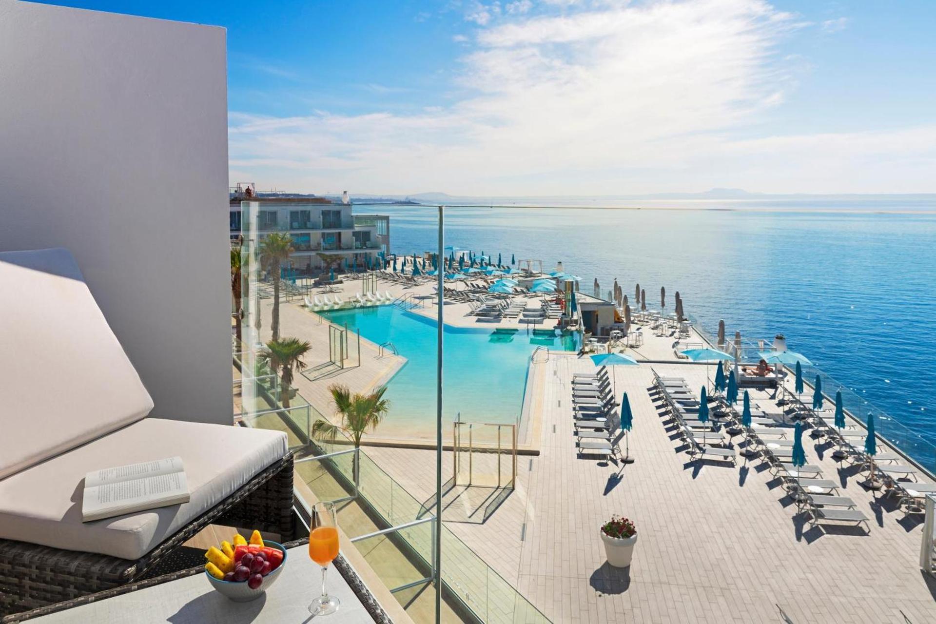 Balcony views overlooking the outdoor swimming pools at Elba Sunset Mallorca & Thalasso Spa