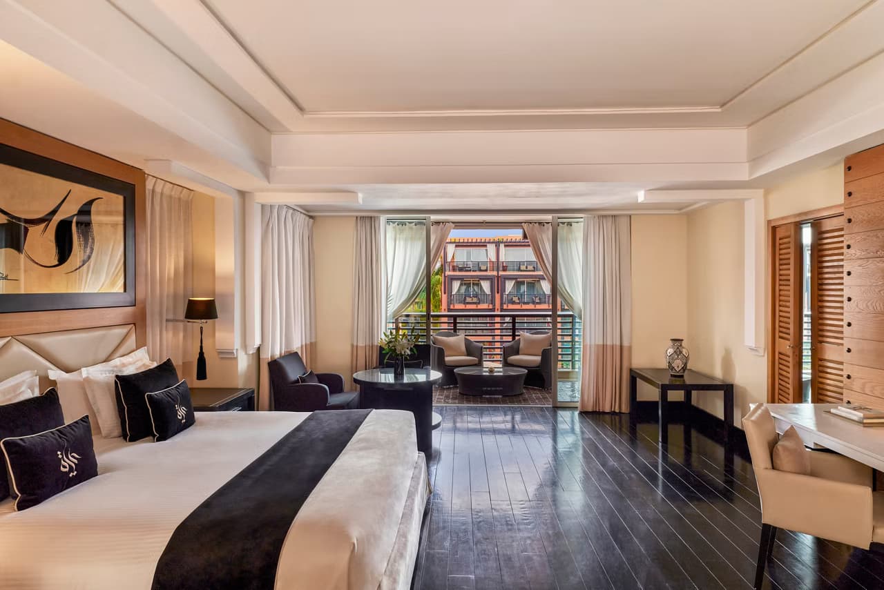 Double bed suite with balcony views at Hotel & Ryads Barrière Le Naoura