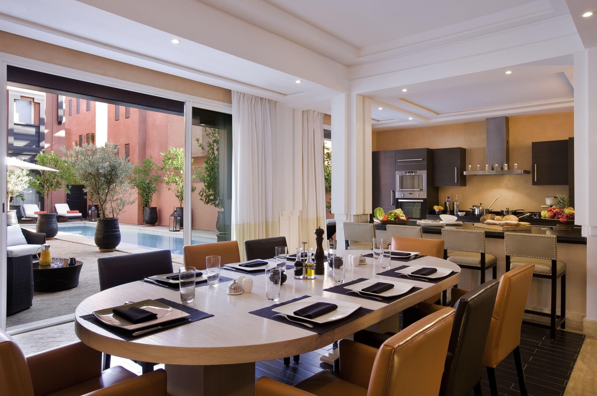 Living room and dining area as part of a villa at Hotel & Ryads Barrière Le Naoura