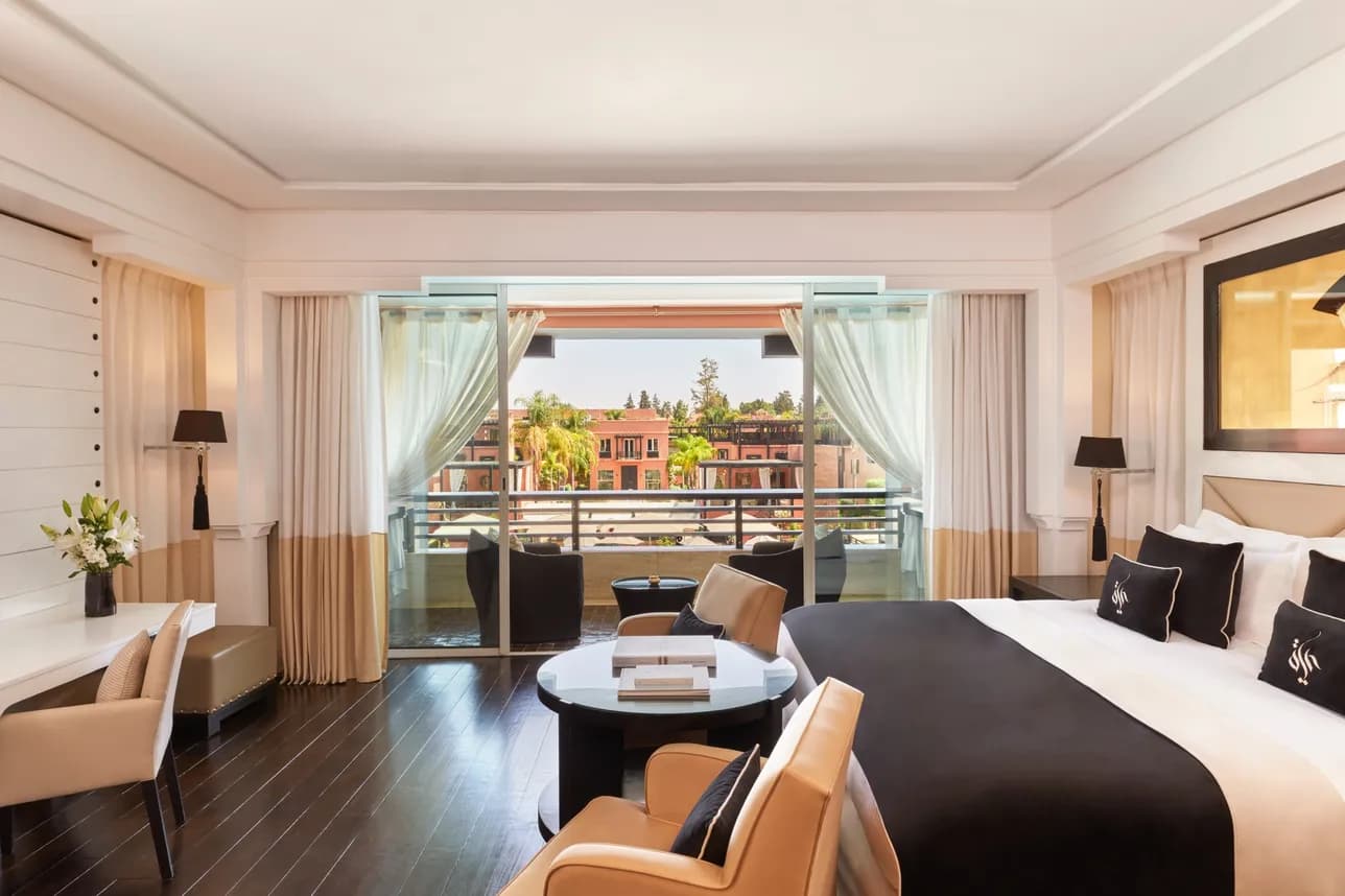 Double bed suite with balcony views at Hotel & Ryads Barrière Le Naoura