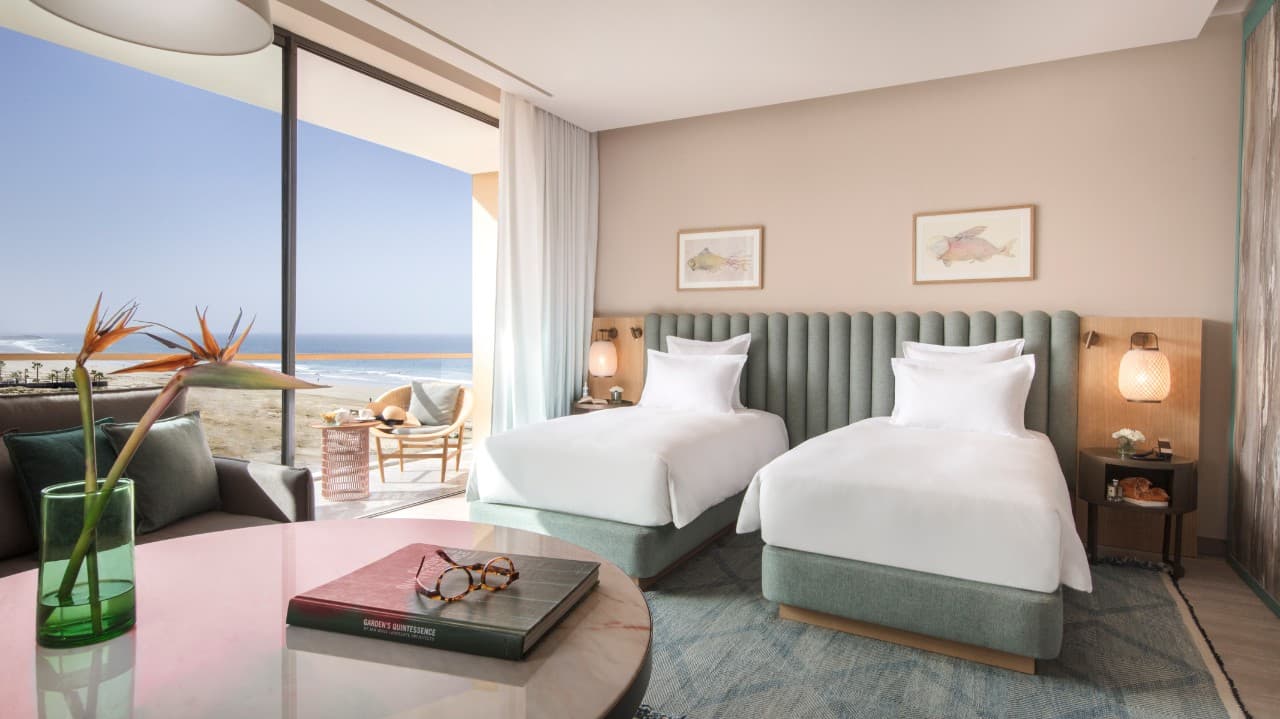Twin bed suite with a patio that leads straight to the beach at Hyatt Regency Taghazout Bay