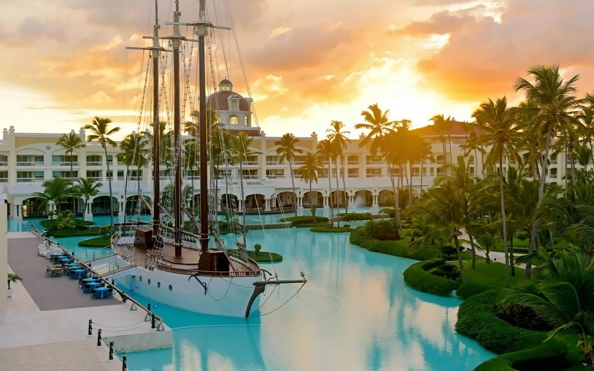 Panoramic view of the sun setting over Iberostar Grand Hotel Bávaro