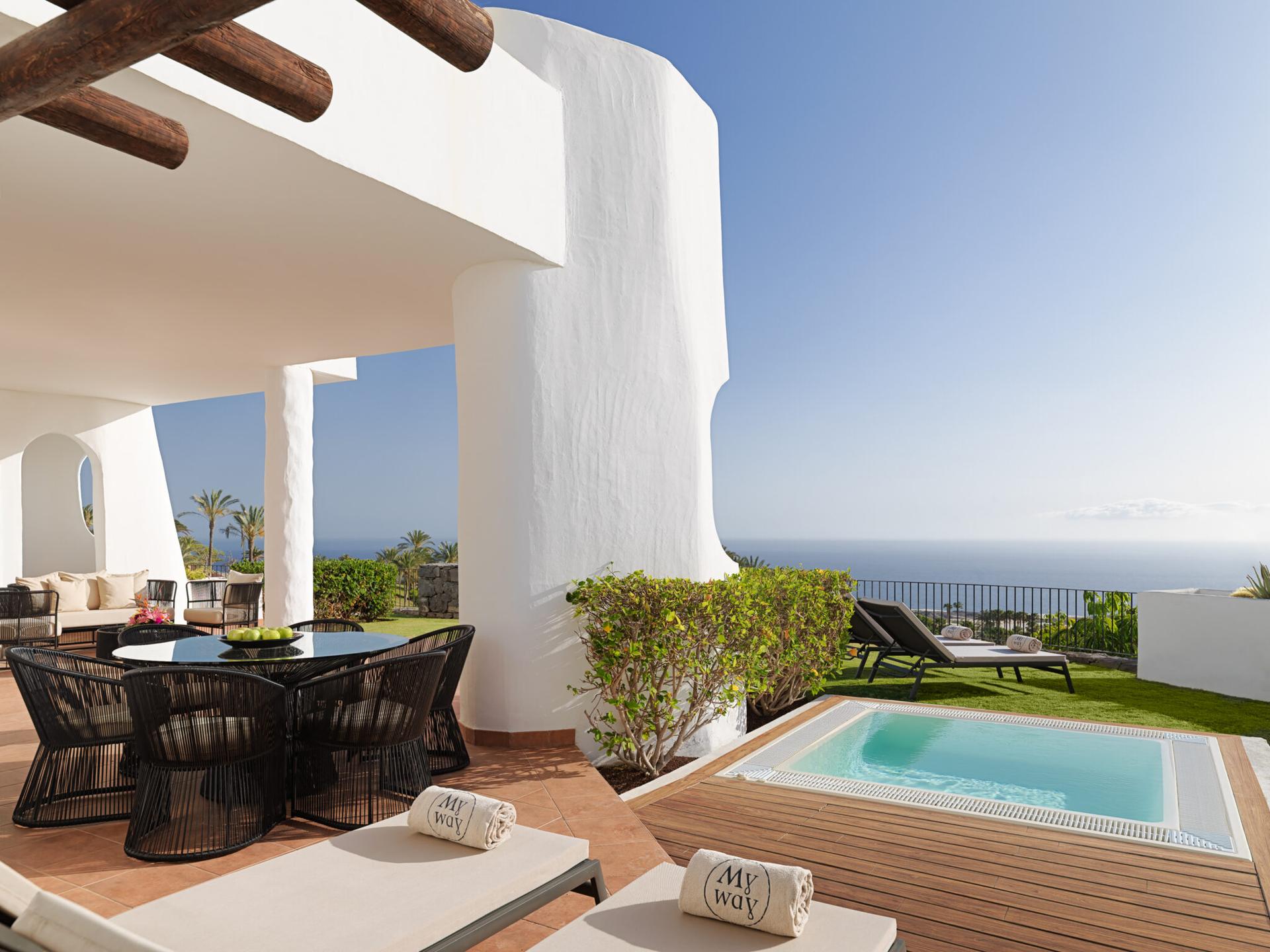 Jacuzzi and an outdoor lounging area as part of a villa at Las Terrazas de Abama