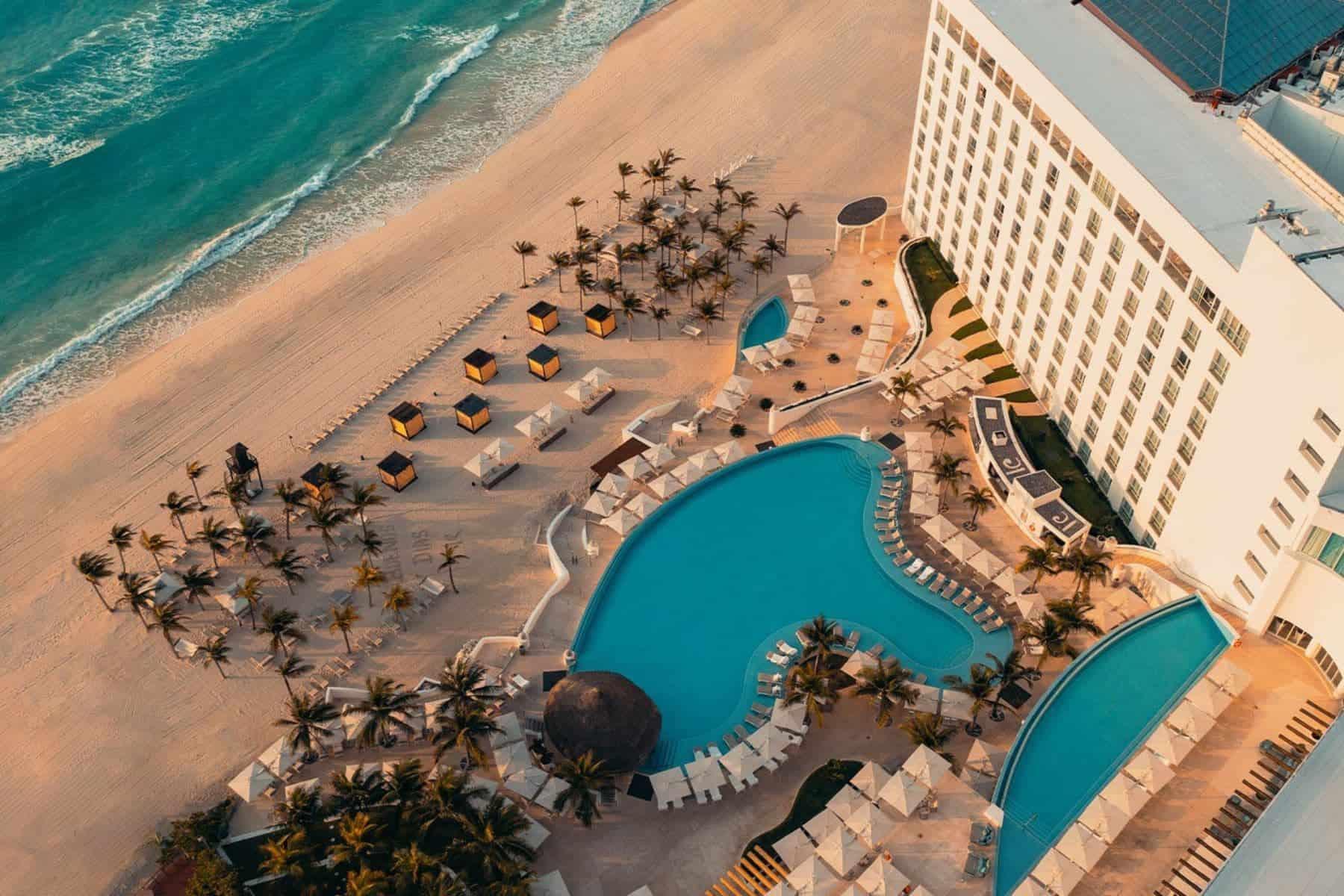 Aerial view looking down on the outdoor pool at Le Blanc Spa Resort