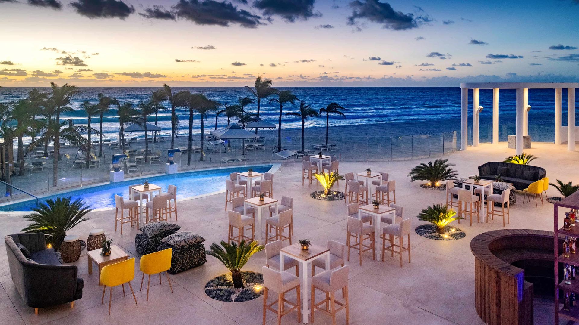 Outdoor dining area at Le Blanc Spa Resort