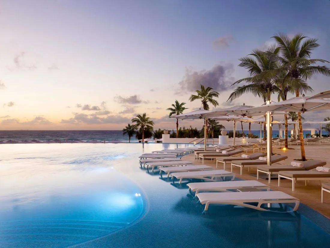 Panoramic view of the outdoor swimming pool at Le Blanc Spa Resort
