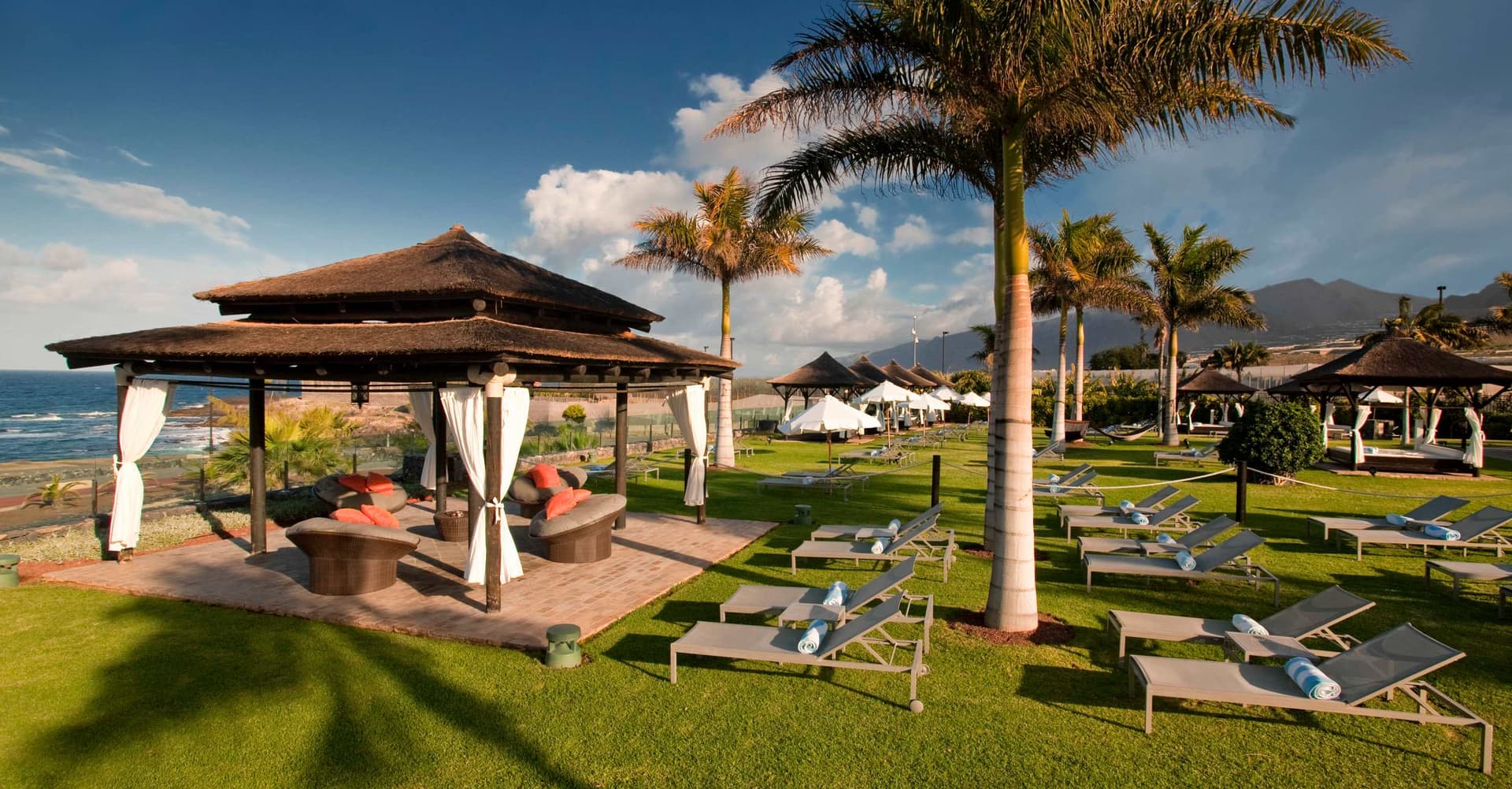 Outdoor lounging area at RedLevel at Gran Meliá Palacio de Isora
