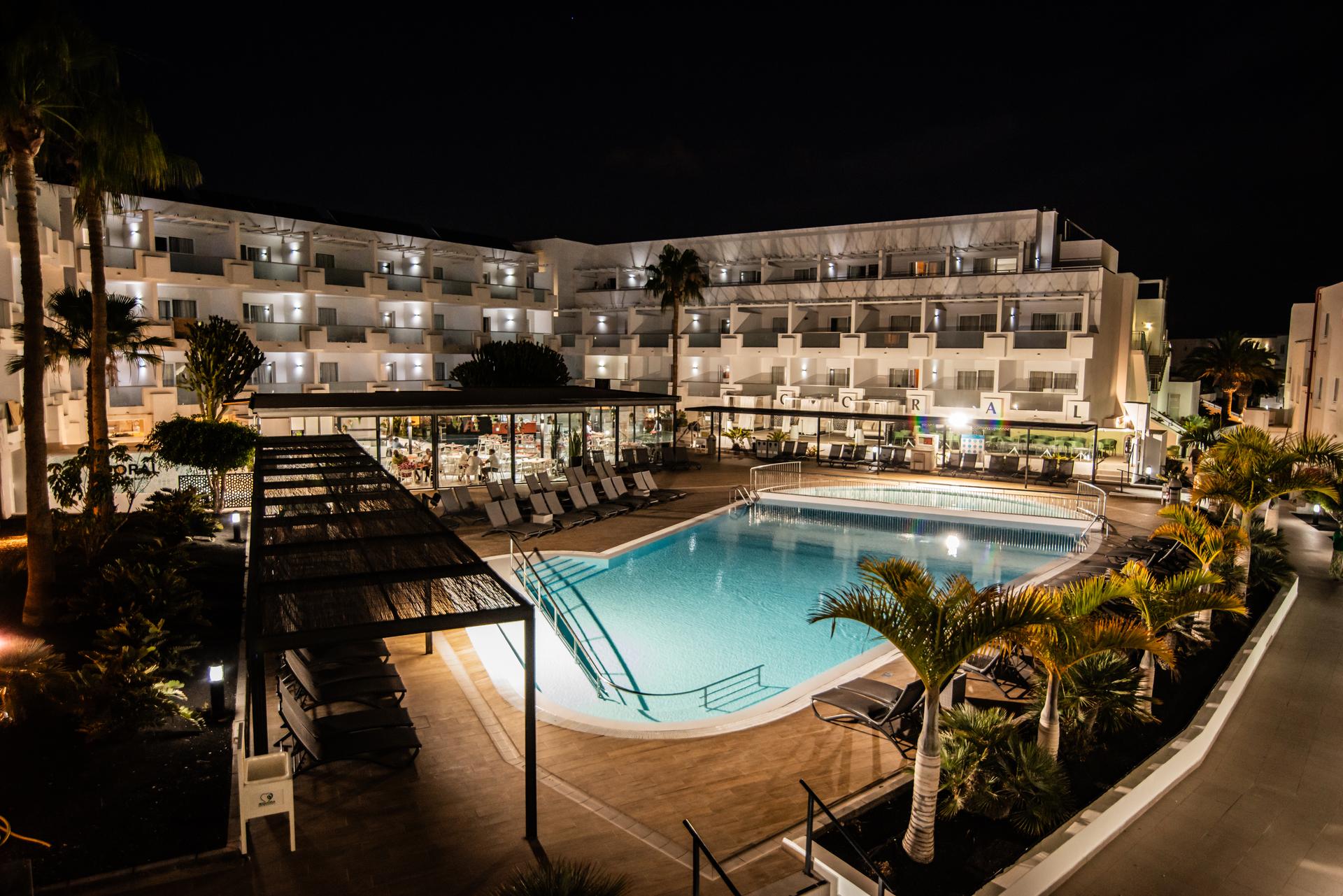 Overhead view of Aequora Lanzarote Suites lit up at night