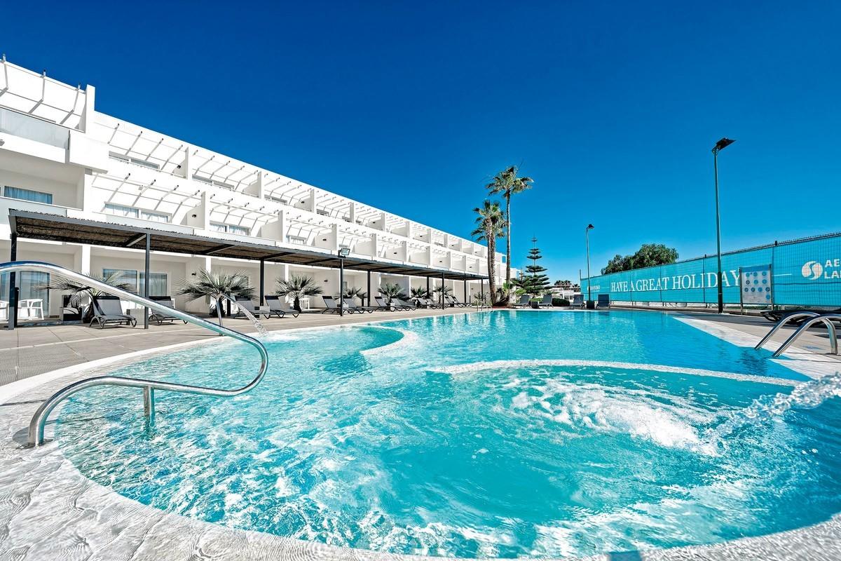 The Aequora Lanzarote Suites building overlooking the outdoor swimming pool