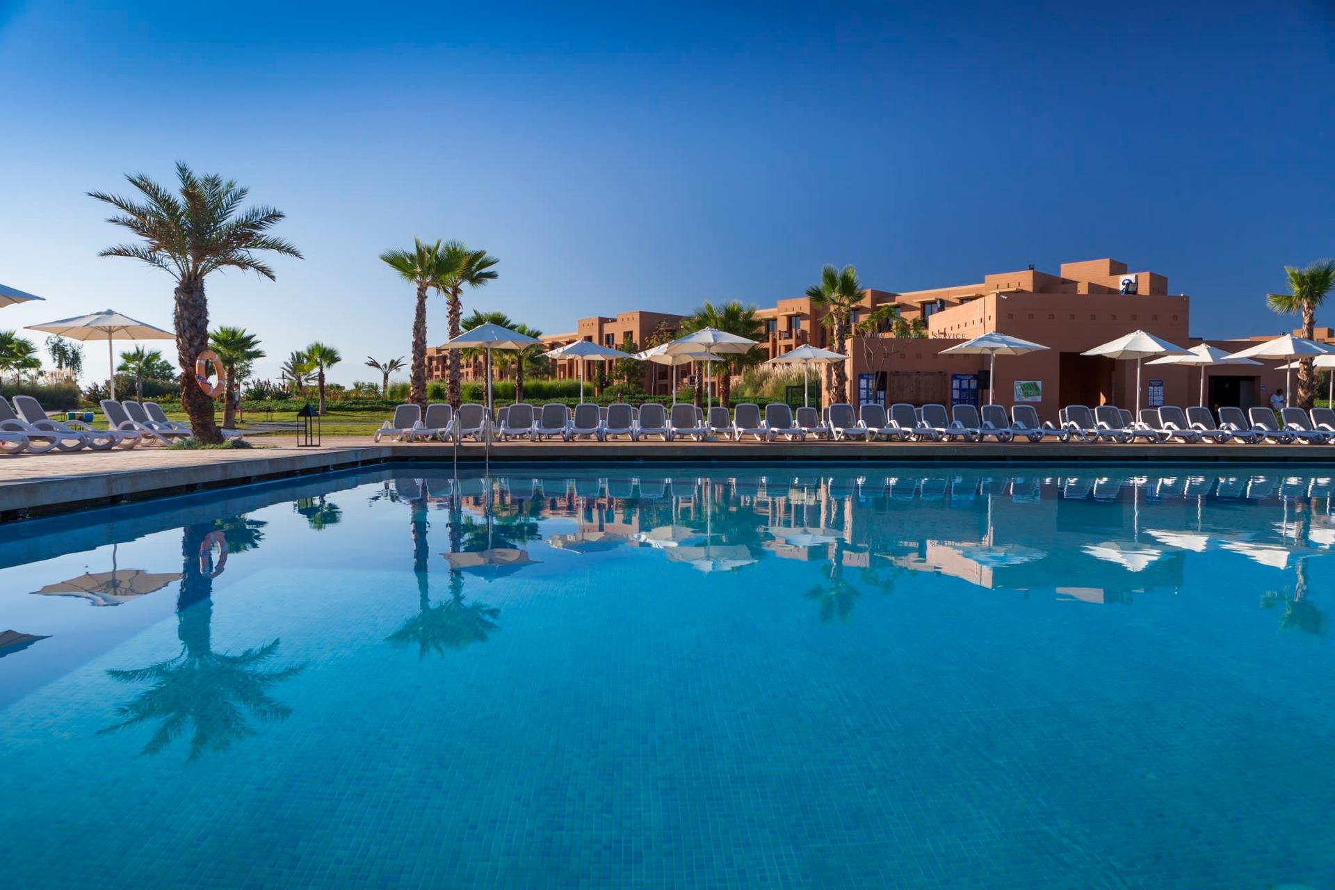 Panoramic view of the outdoor swimming pool at Fairmont Royal Palm Marrakech