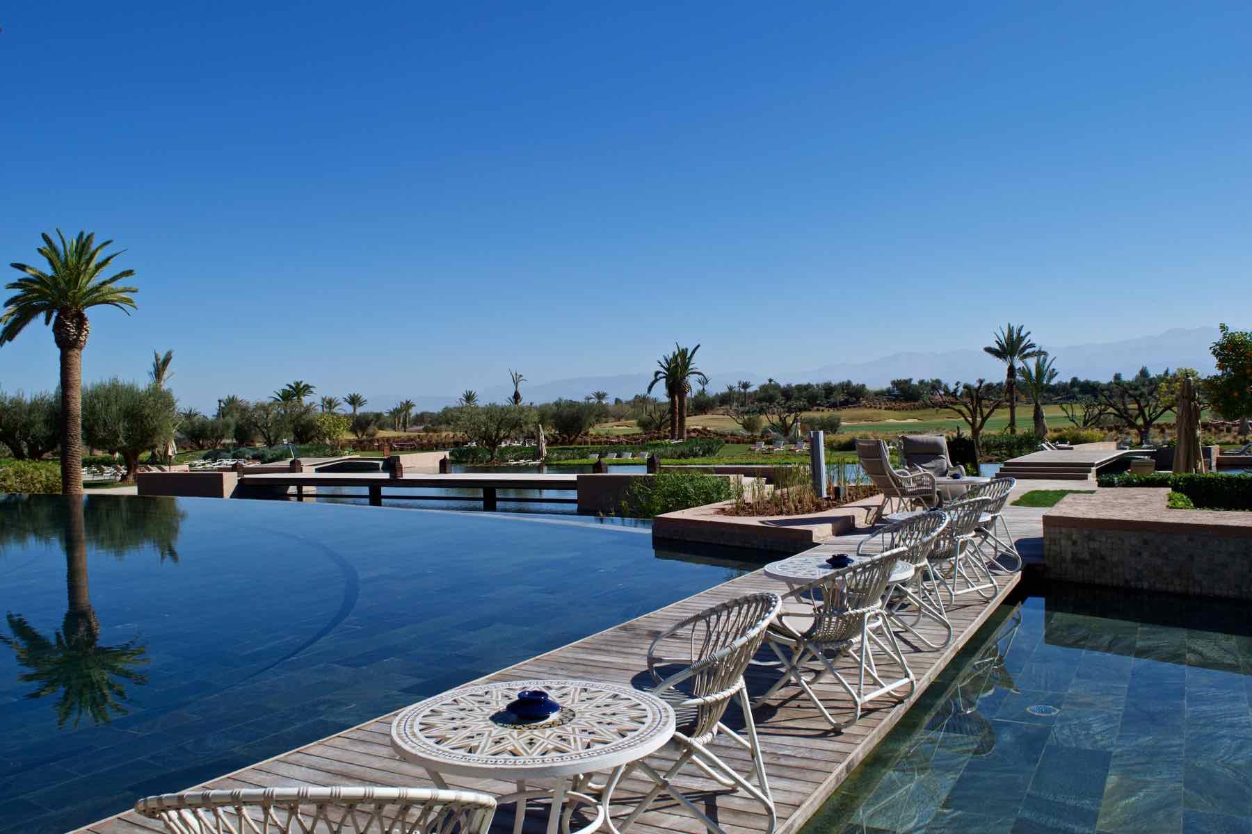 Overhead view of an outdoor swimming pool at Fairmont Royal Palm Marrakec