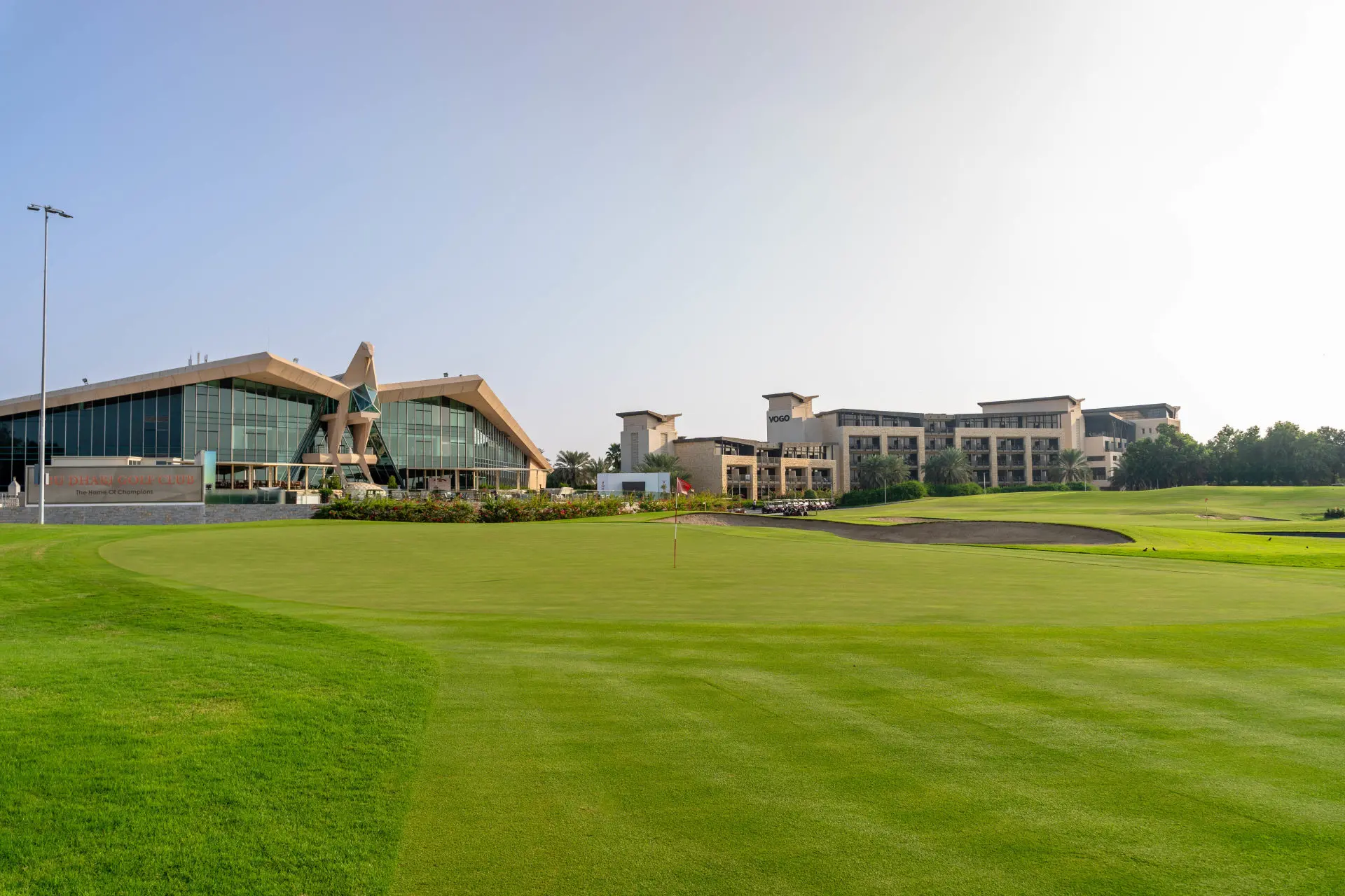 The VOGO Abu Dhabi Golf Resort & Spa buildinng overlooking the course