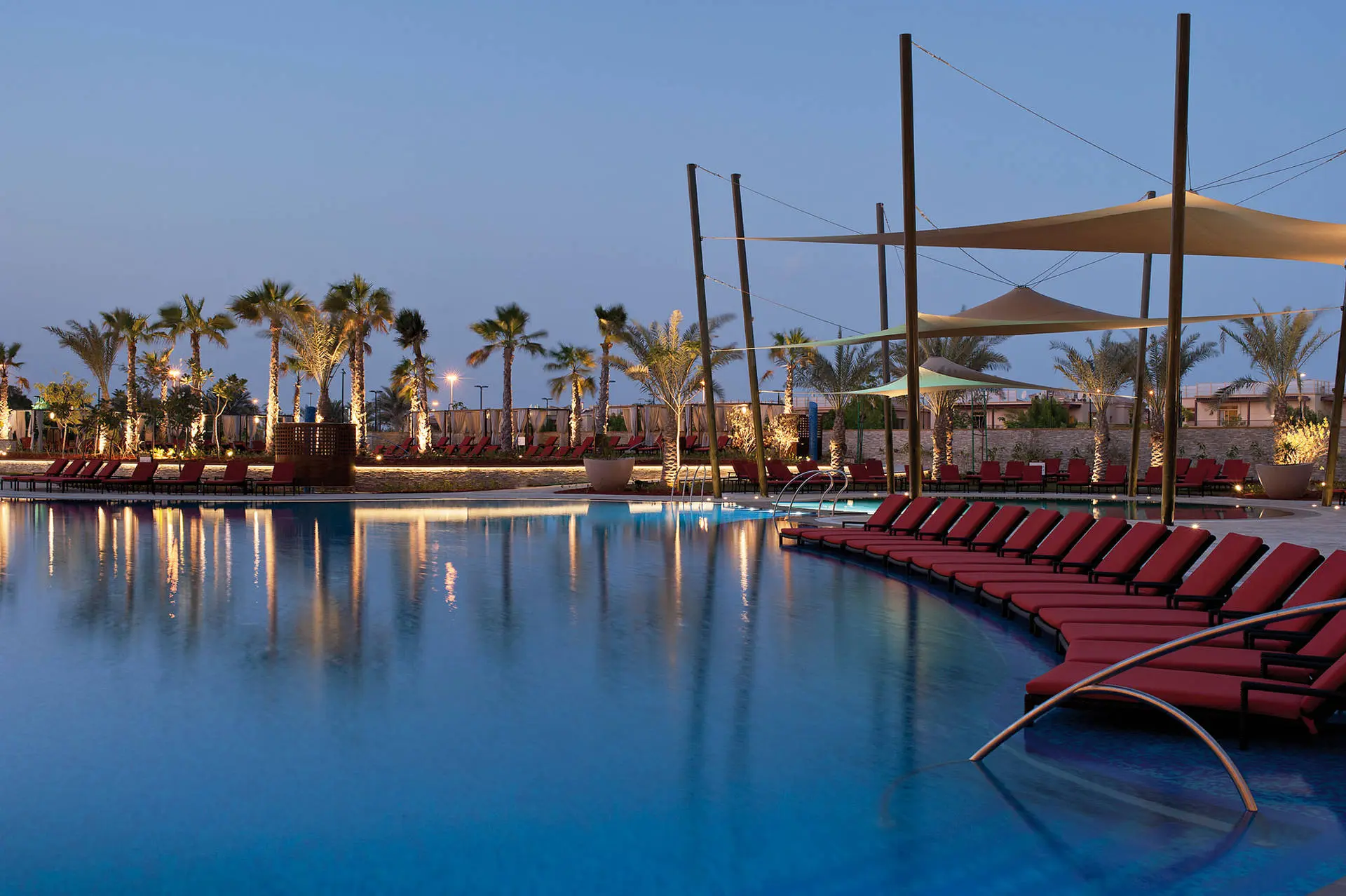 Outdoor swimming pool at the VOGO Abu Dhabi Golf Resort & Spa