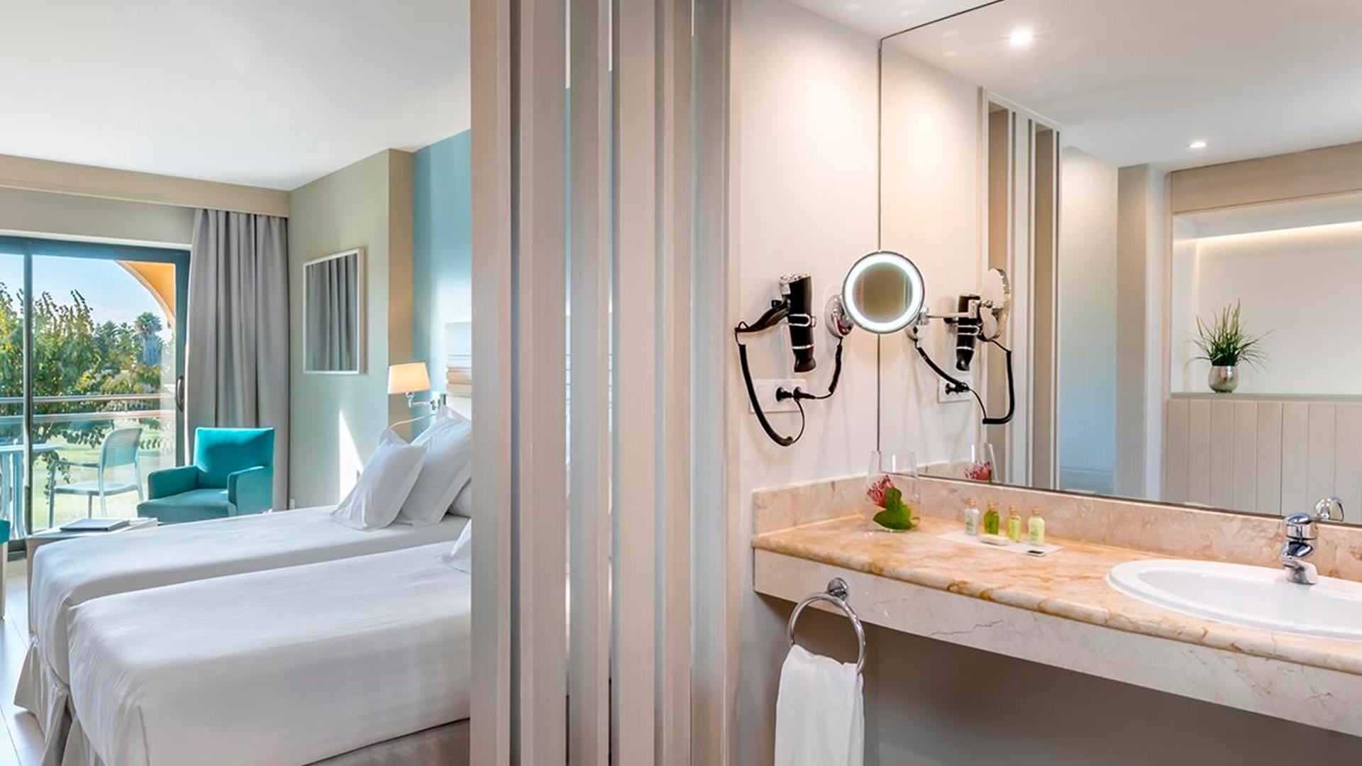 Bathroom as part of a suite at Barcelo Costa Ballena Golf & Spa