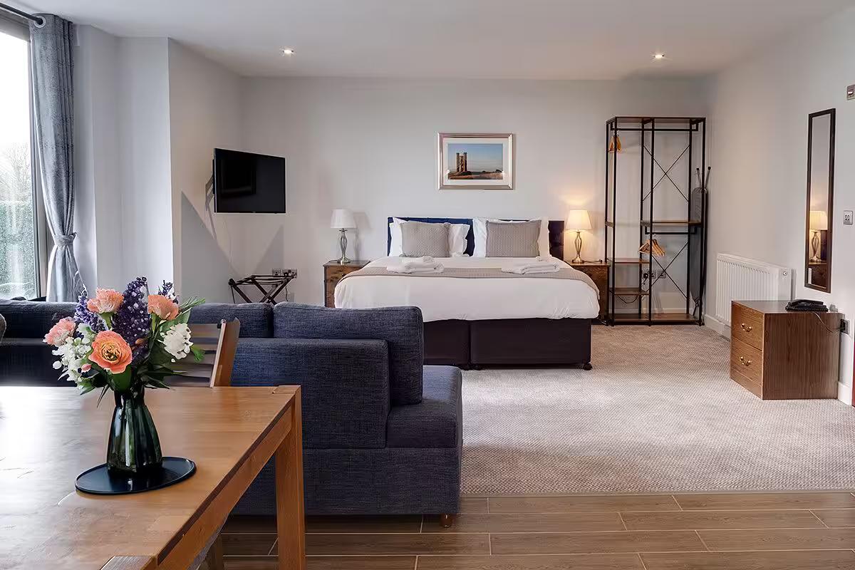 Spacious double bed suite at Cotswolds Golf Hotel and Spa