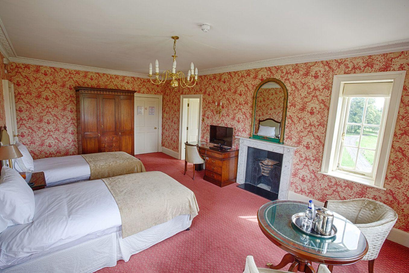 Twin bed room at the Donnington Grove Hotel & Country Club