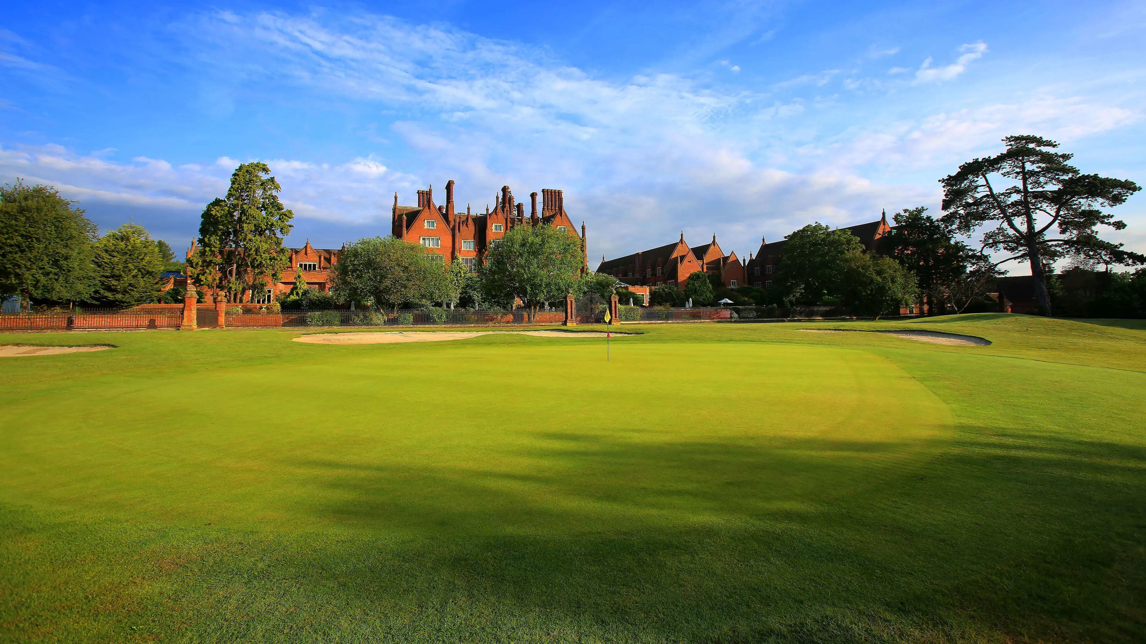The Dunston Hall Hotel Spa & Golf Resort clubhouse overlooking the course