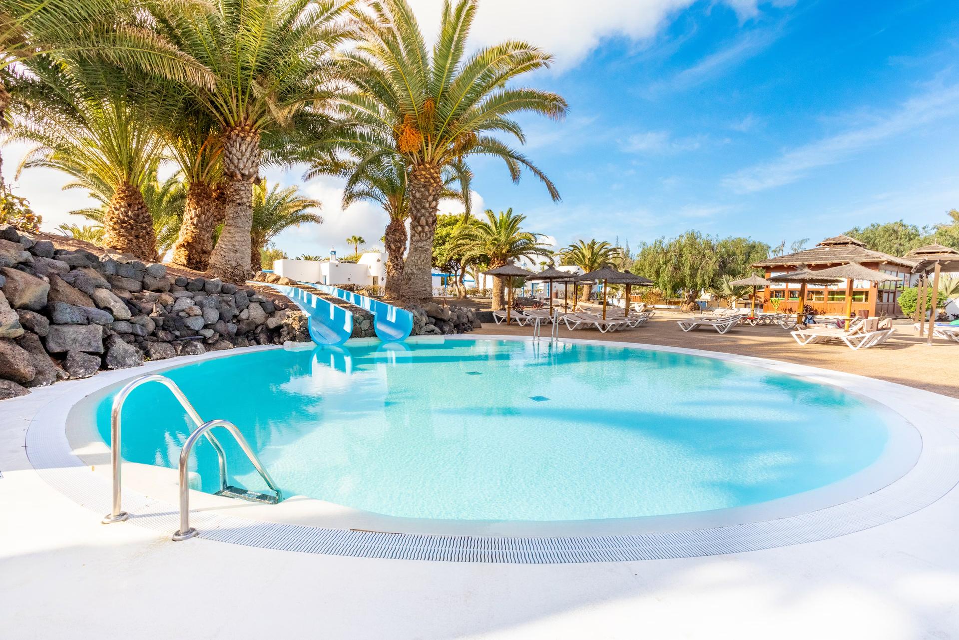 Outdoor swimming pool at Elba Lanzarote Royal Village Resort