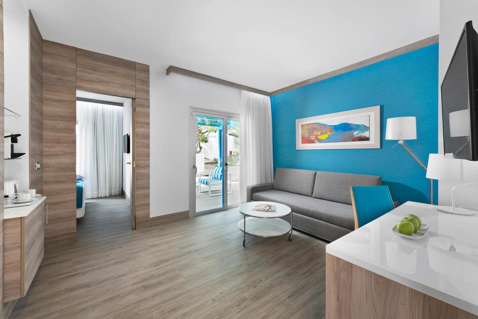 Living room as part of a double bed suite at Elba Lanzarote Royal Village Resort