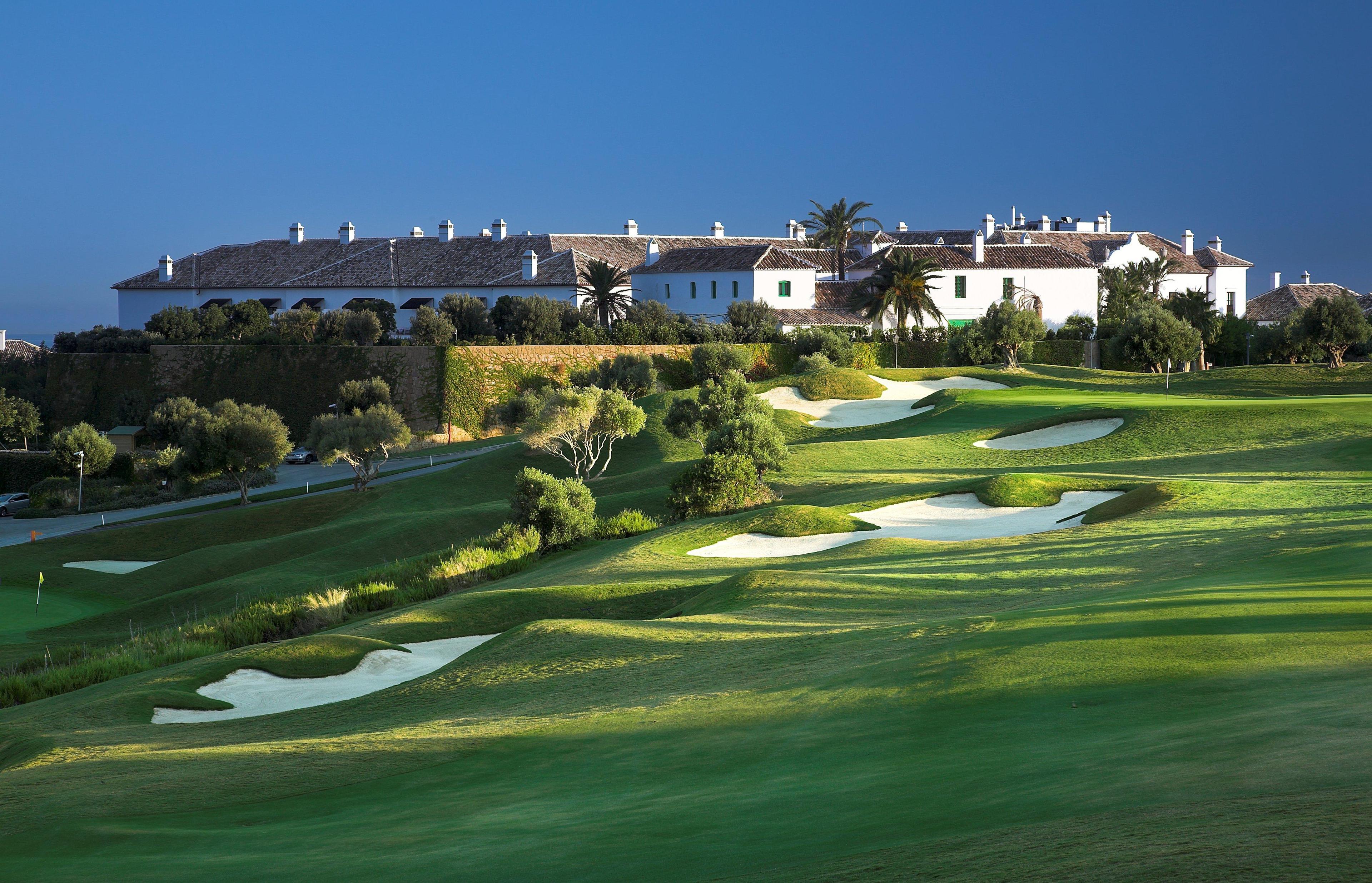 Panoramic view of the hilltop Finca Cortesin Hotel overlooking their on-site golf course