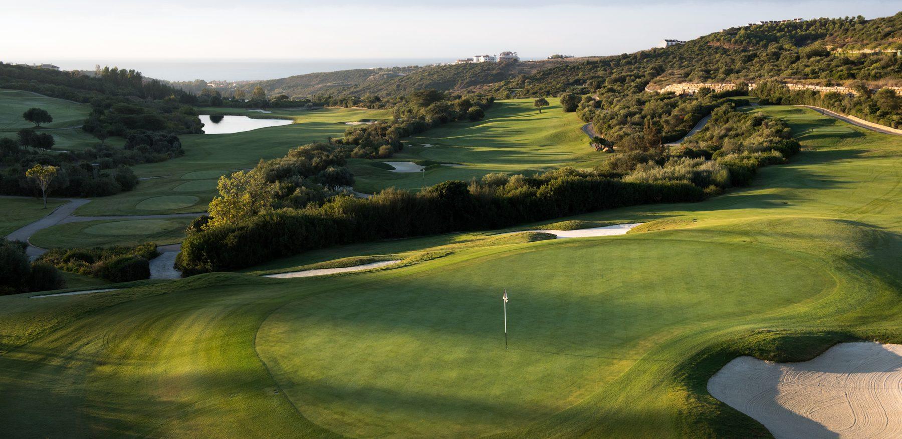 A smooth green surrounded by sand bunkers