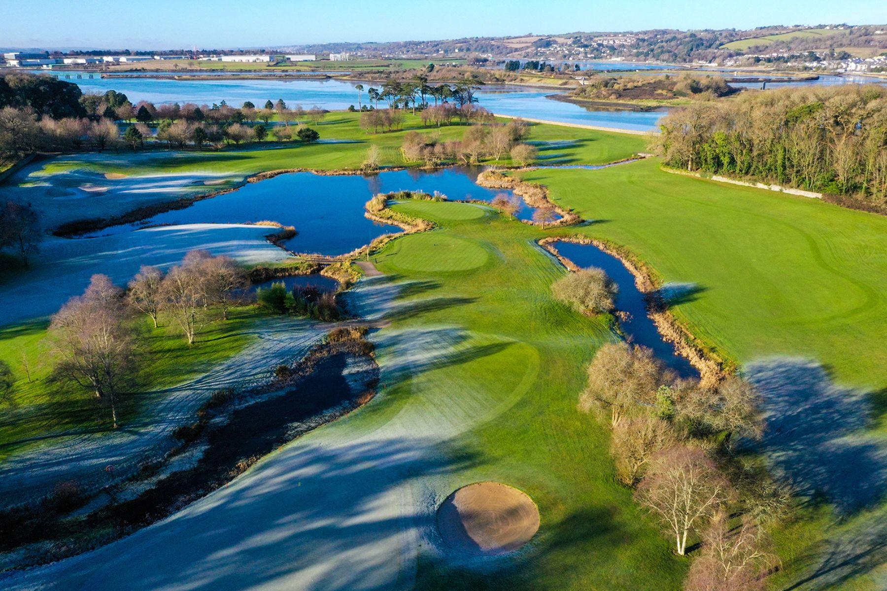 Overhead view of a well maintained fairway leading to a smooth green