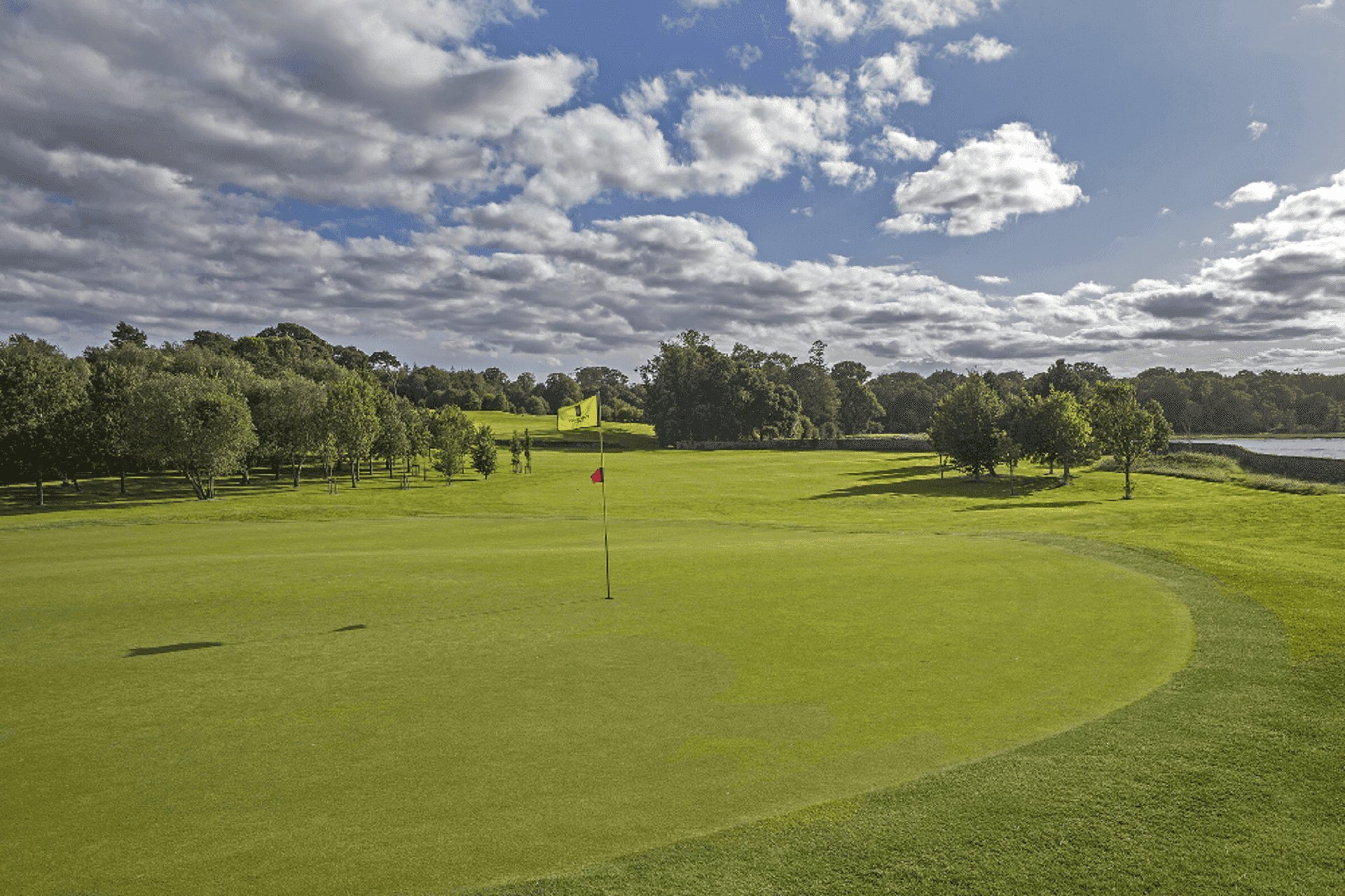 A smooth green at Fota Island Resort with a red flagstick
