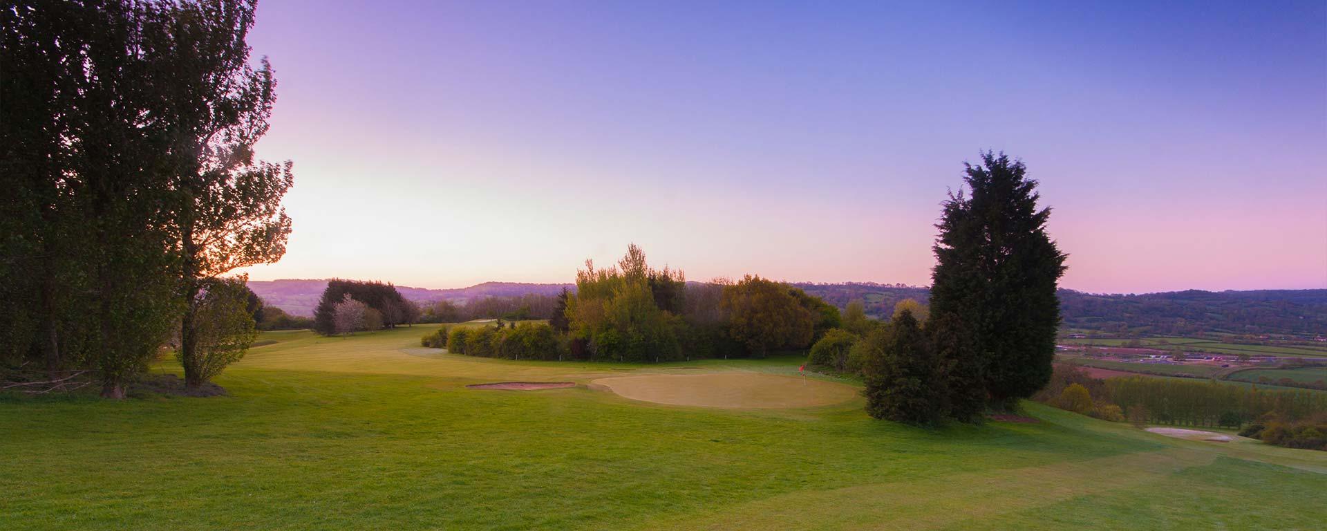 Sun setting over the golf course