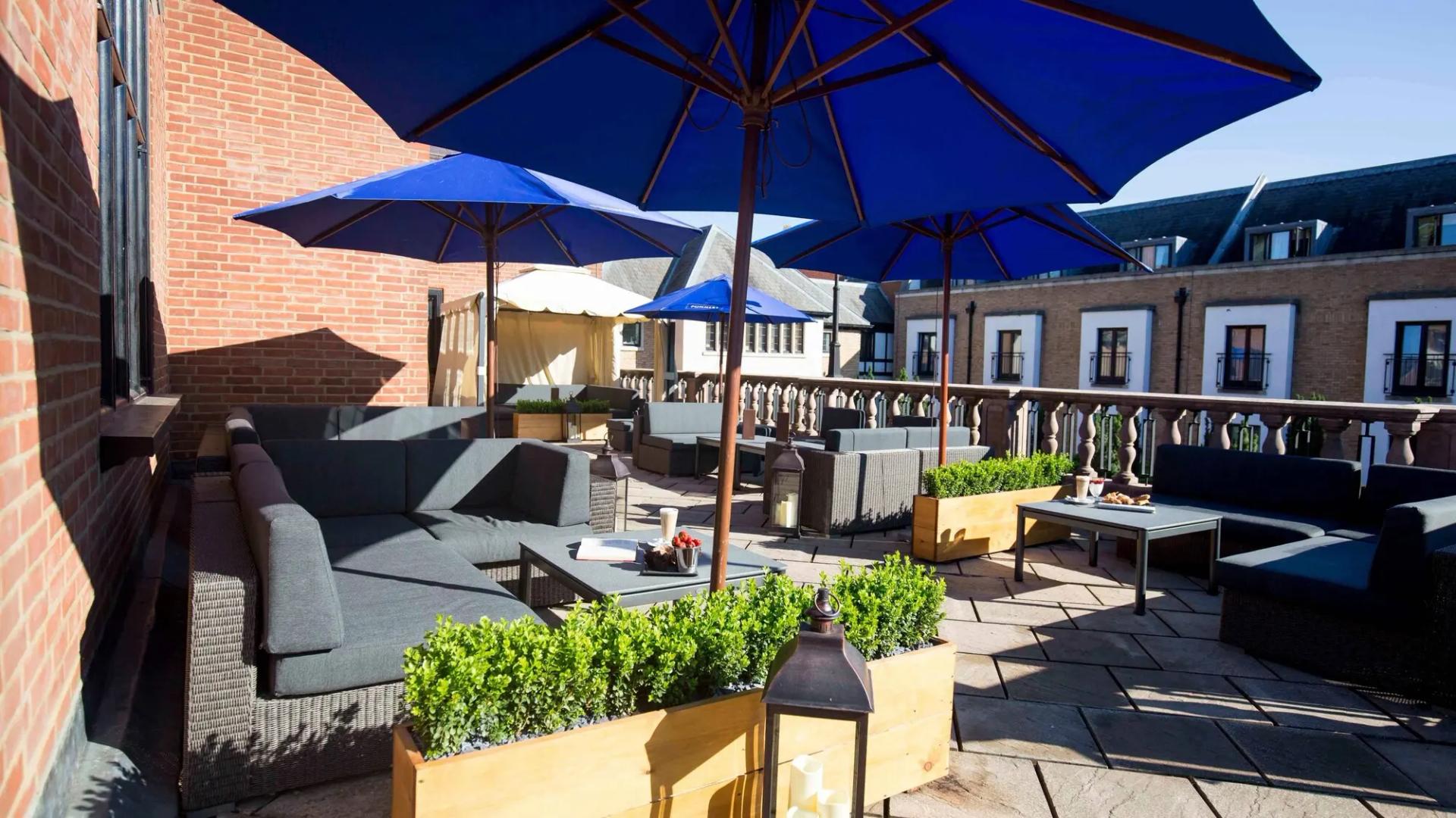 Outdoor lounging area at Hanbury Manor Hotel & Country Club