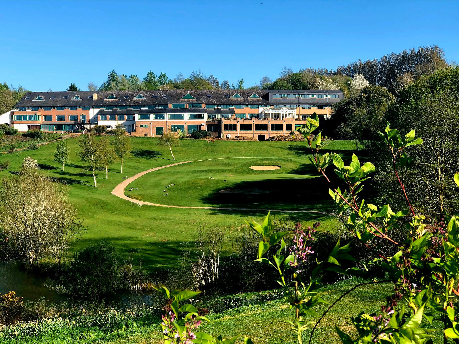Overhead view of the Hellidon Lakes Golf & Spa Hotel building overlooking the course