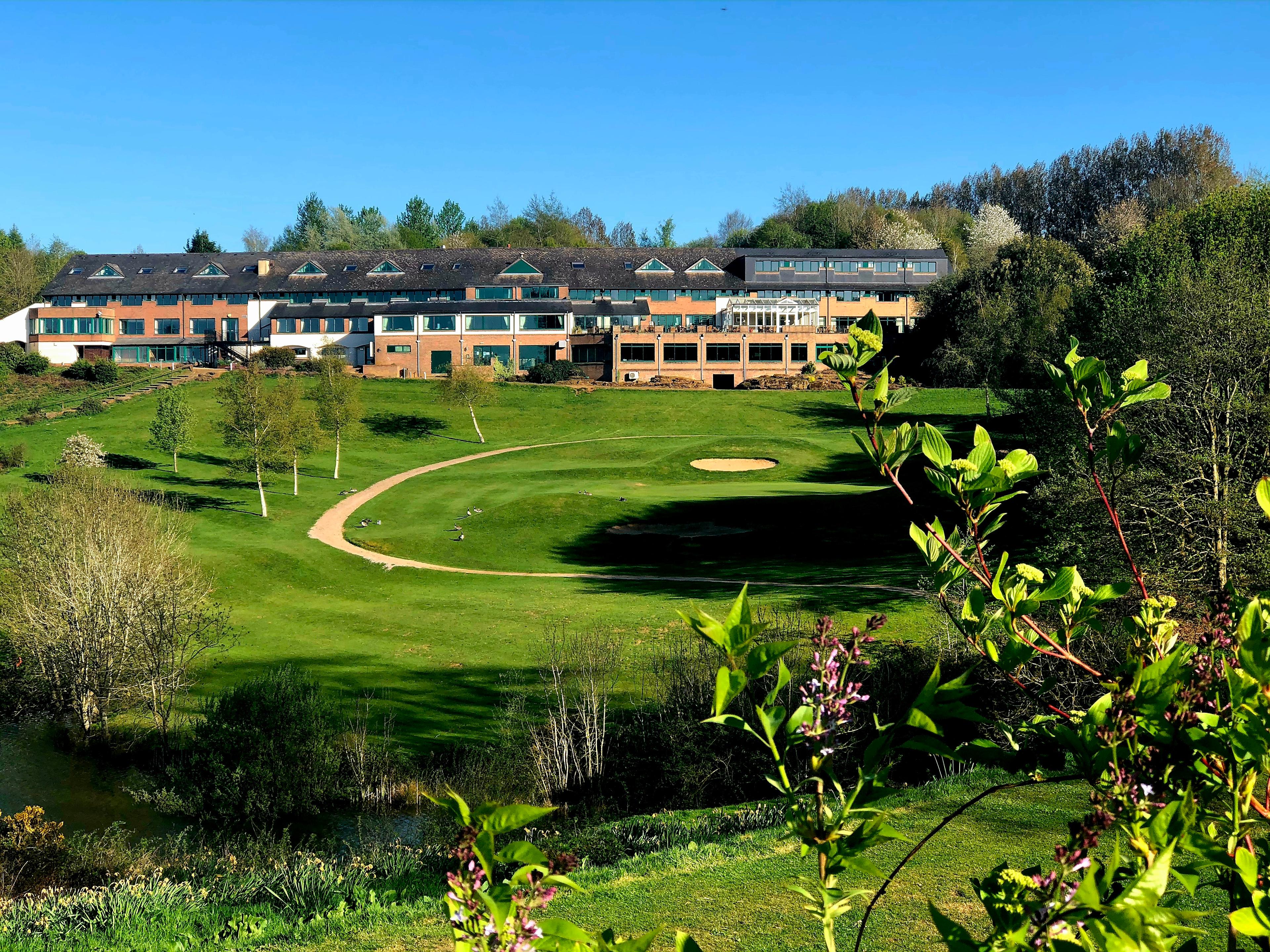 Overhead view of the Hellidon Lakes Golf & Spa Hotel building overlooking the course