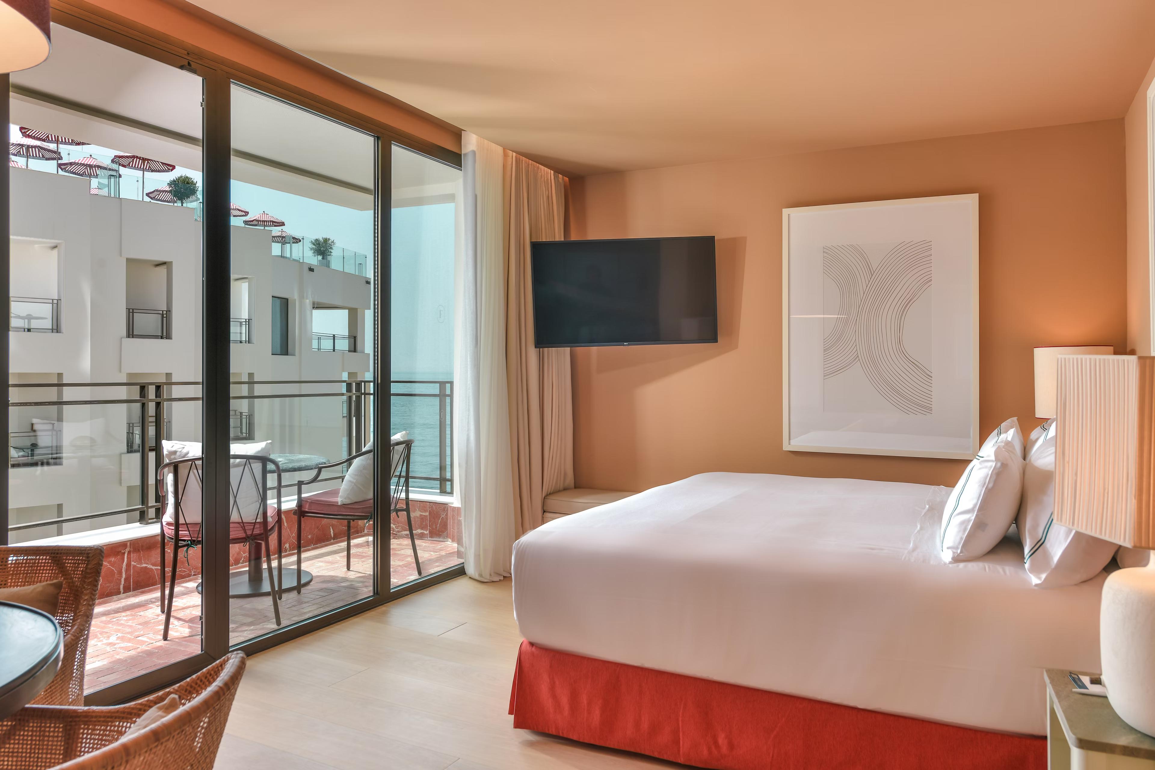 Double bed suite with balcony views at Hotel El Fuerte Marbella