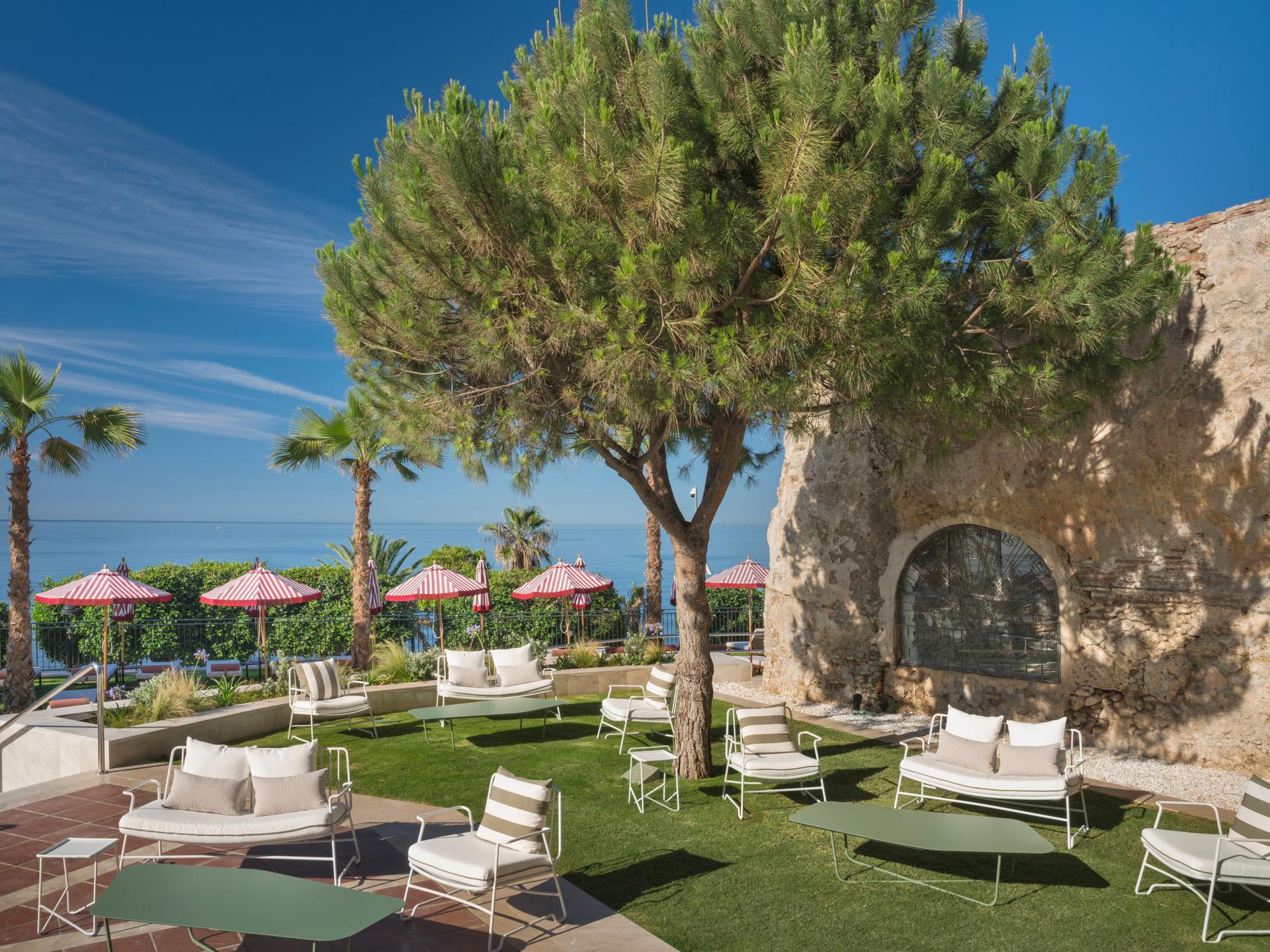 Outdoor lounging area at the Hotel El Fuerte Marbella