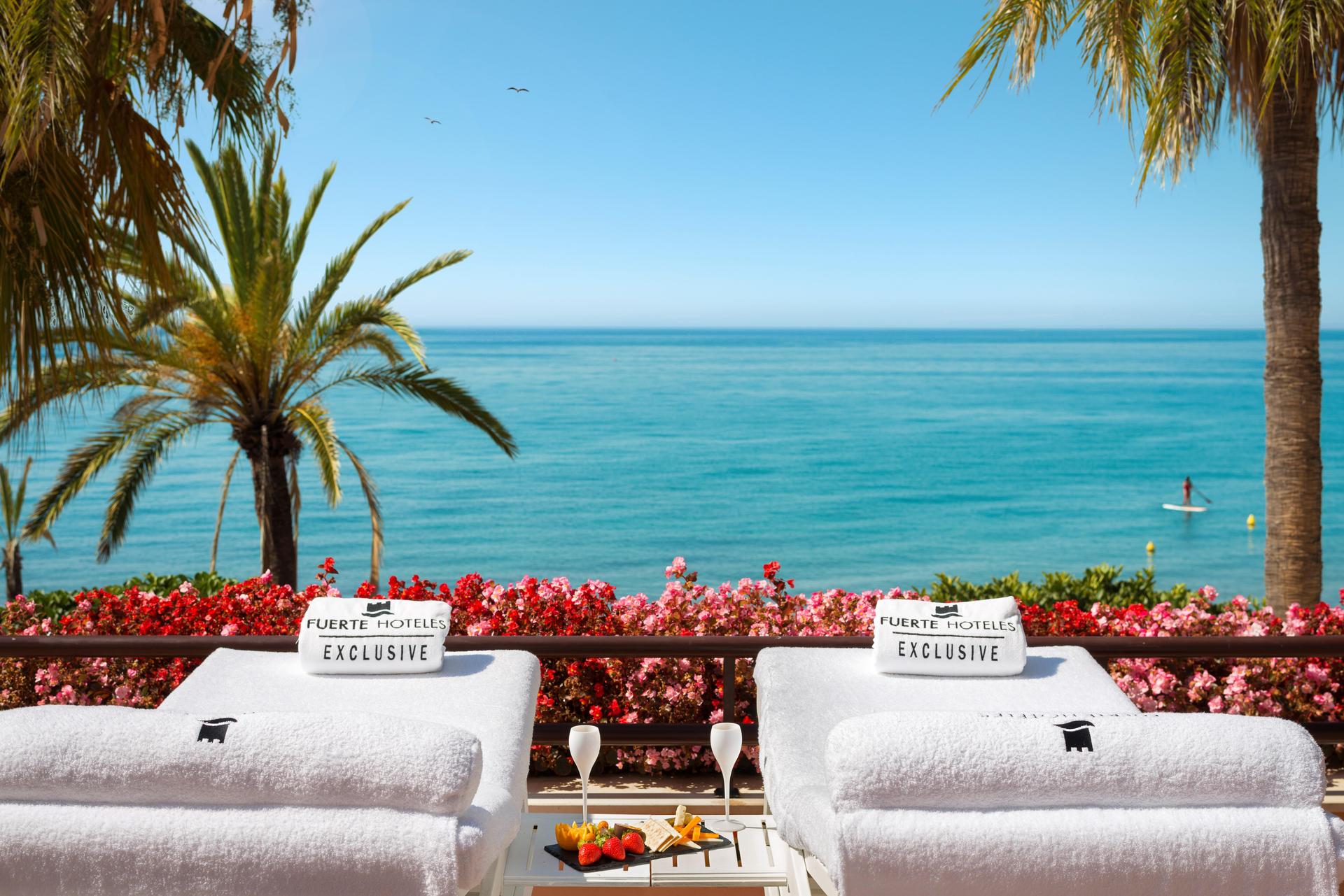 Outdoor spa facilities at Hotel El Fuerte Marbella with beach views