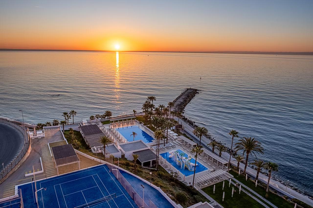 Aerial view of the sun shining over Hotel Estival Torrequebrada