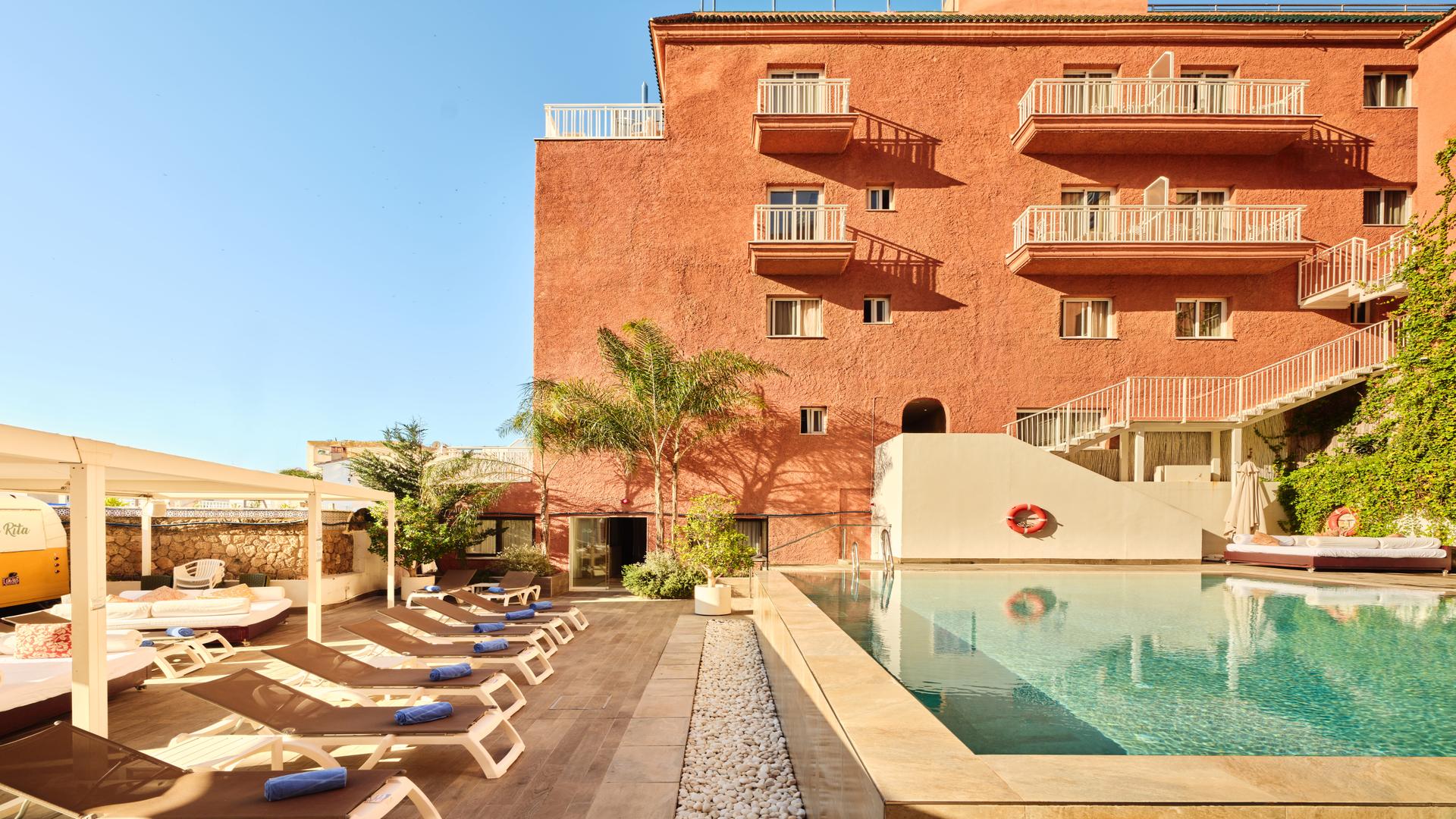 Panoramic view of the outdoor swimming pool at Hotel Fenix Torremolinos - Adults Only