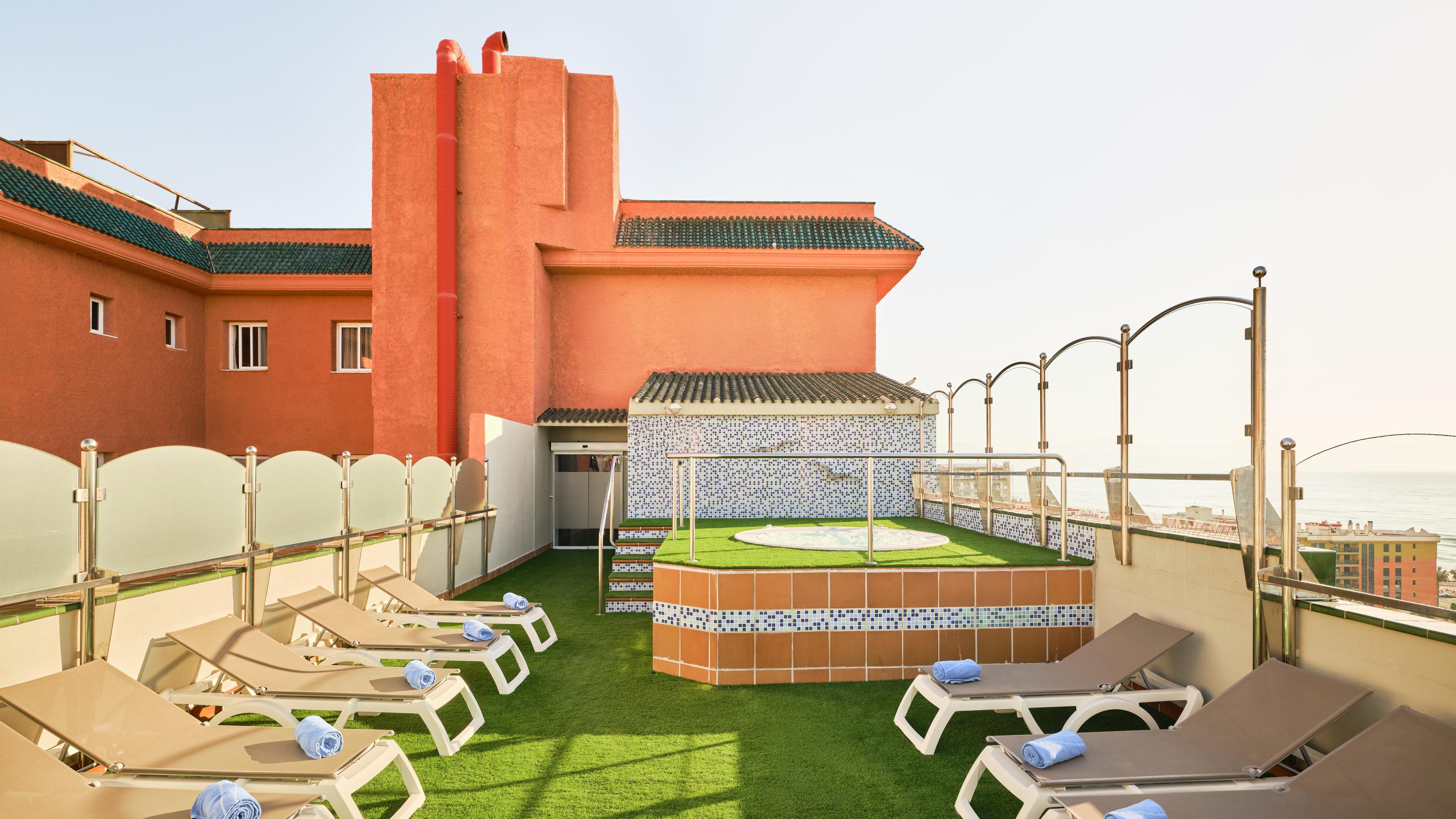 Rooftop lounging at the Hotel Fenix Torremolinos - Adults Only