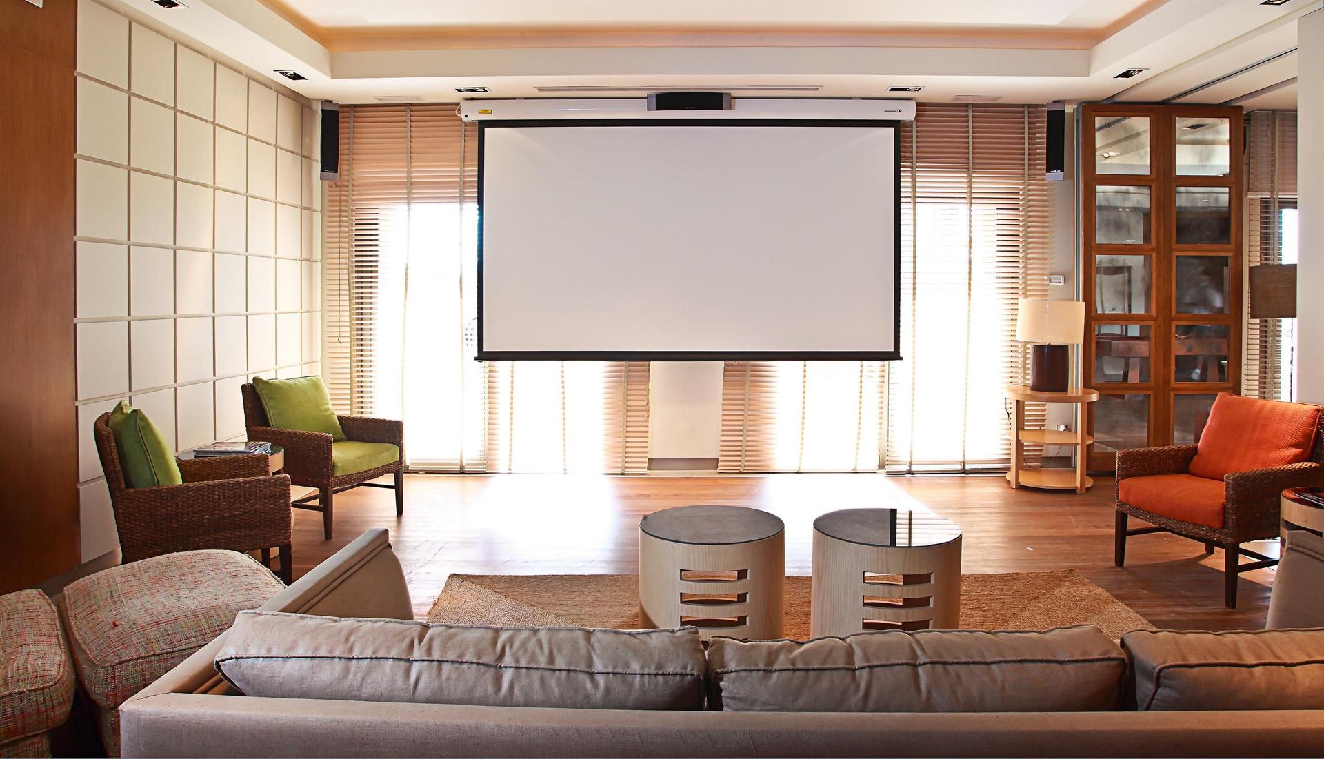 Lounging area with a projector at Hotel MiM Sotogrande Melia