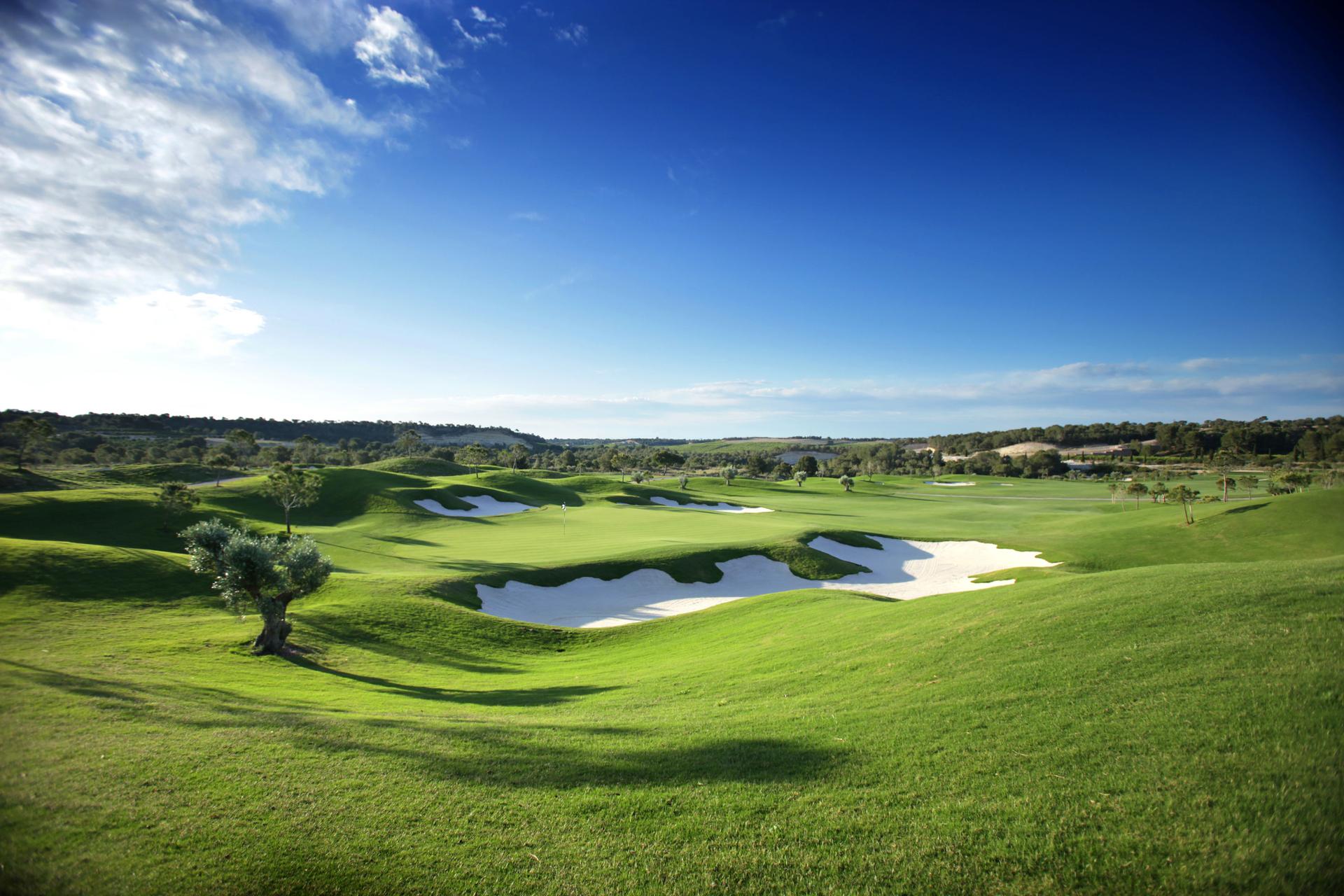 Wide view of the undulating fairways at Las Colinas Golf Club