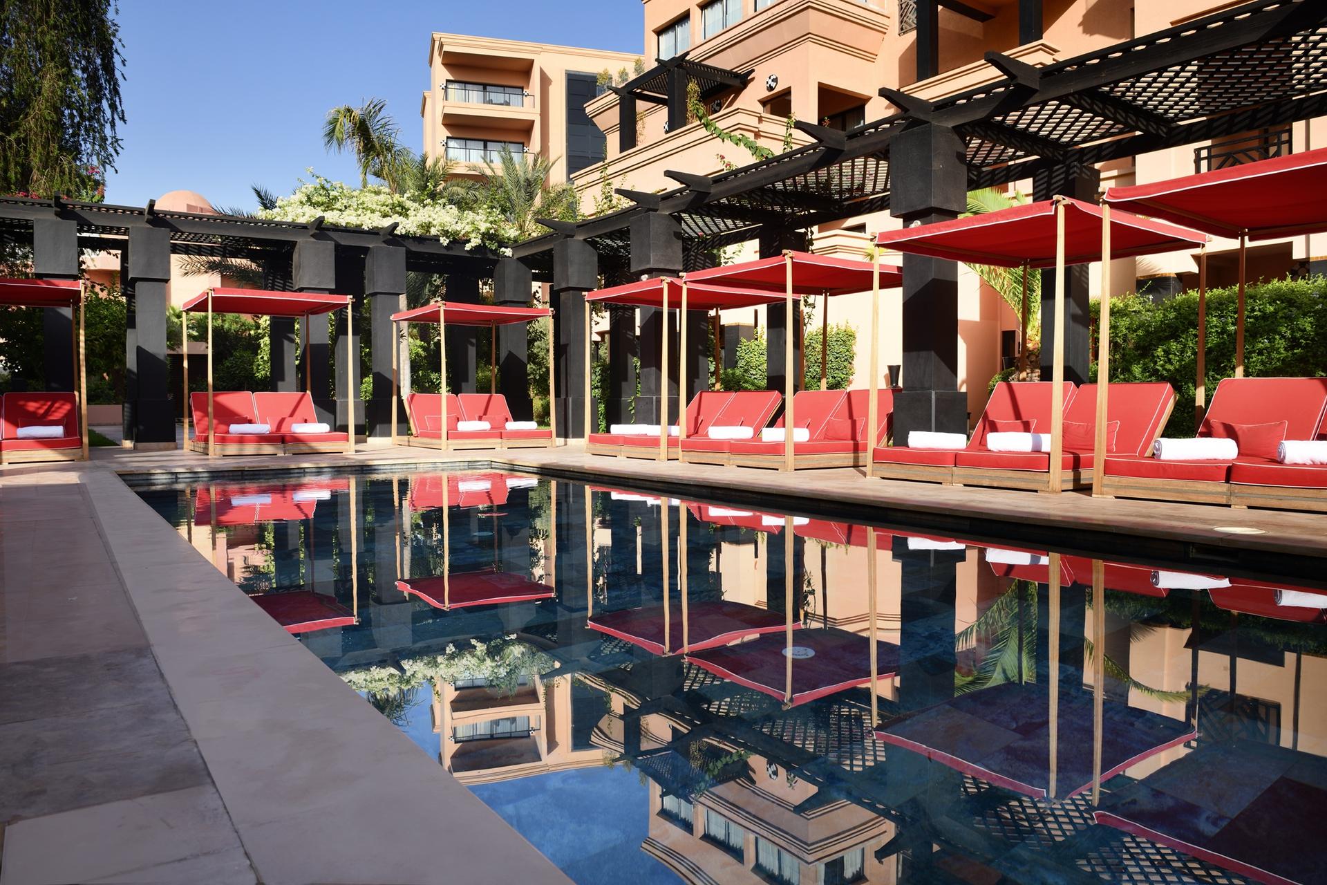 One of the outdoor swimming pools at Movenpick Mansour Eddahbi Hote
