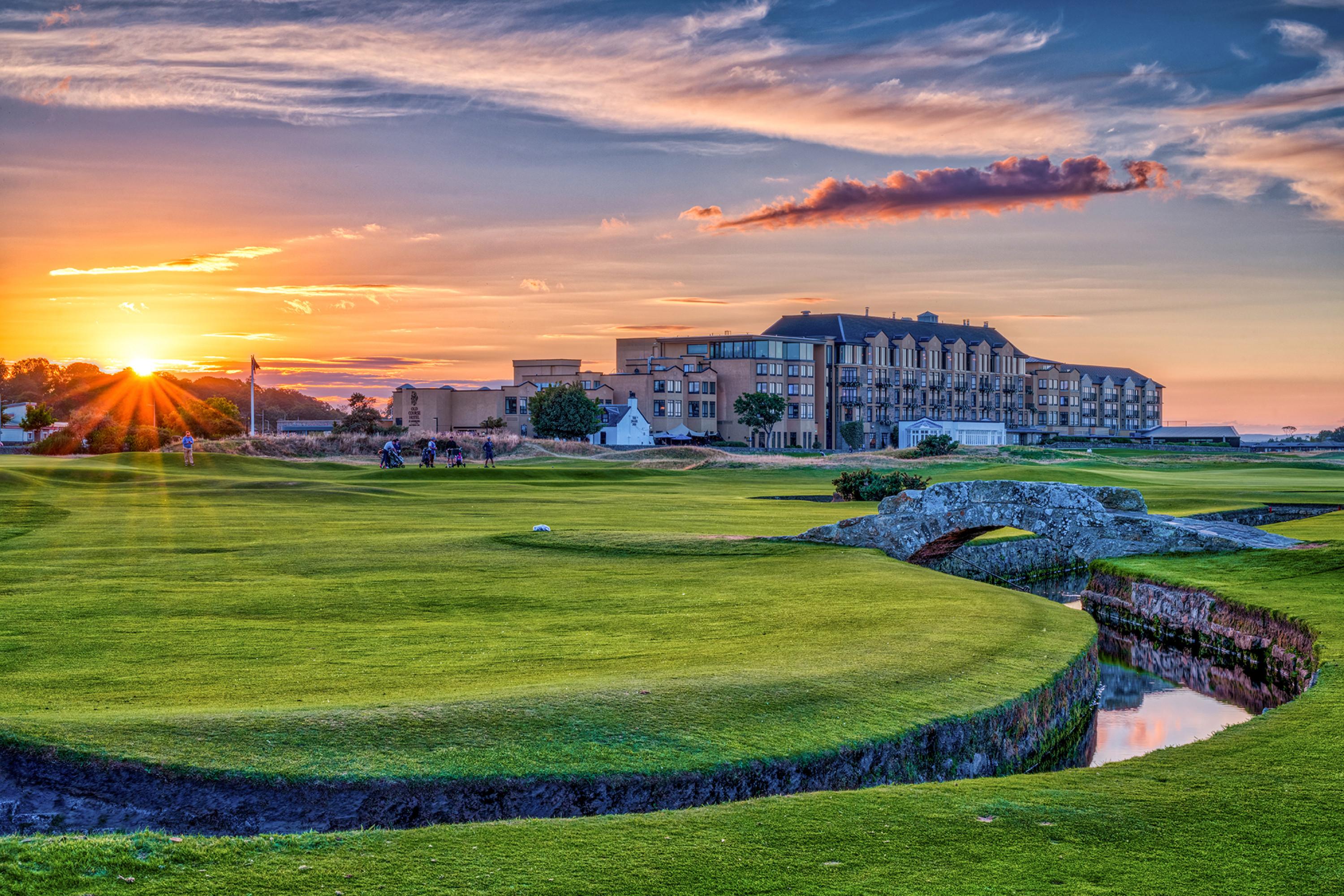 Panoramic view of the sun setting over the Old Course Hotel, Golf Resort & Spa
