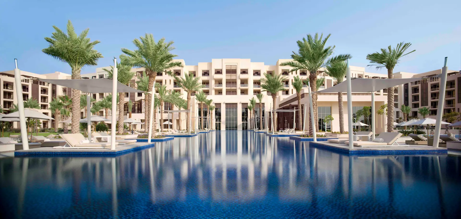 Panoramic view of the Park Hyatt Abu Dhabi Hotel and Villas overlooking the outdoor swimming pool