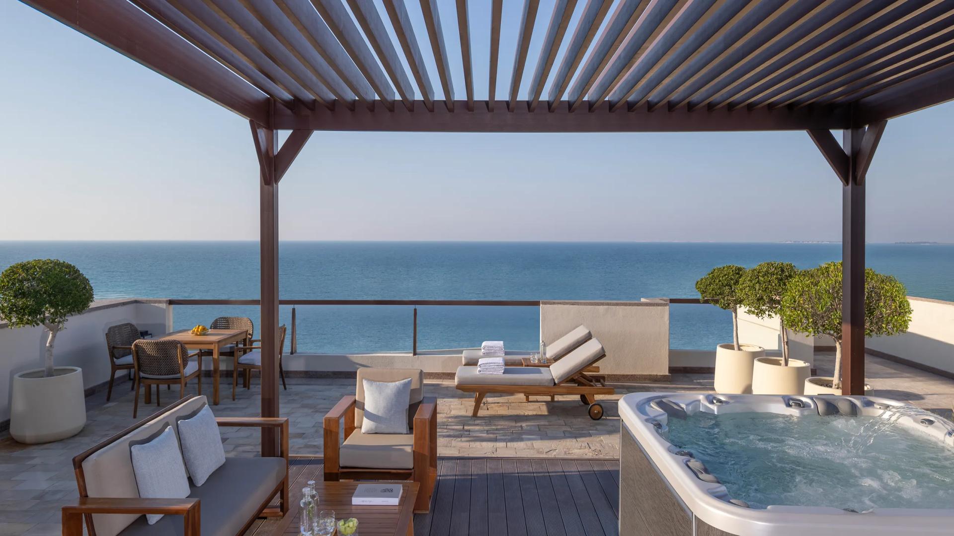 Rooftop lounging area alongside a jacuzzi at the Park Hyatt Abu Dhabi Hotel and Villas