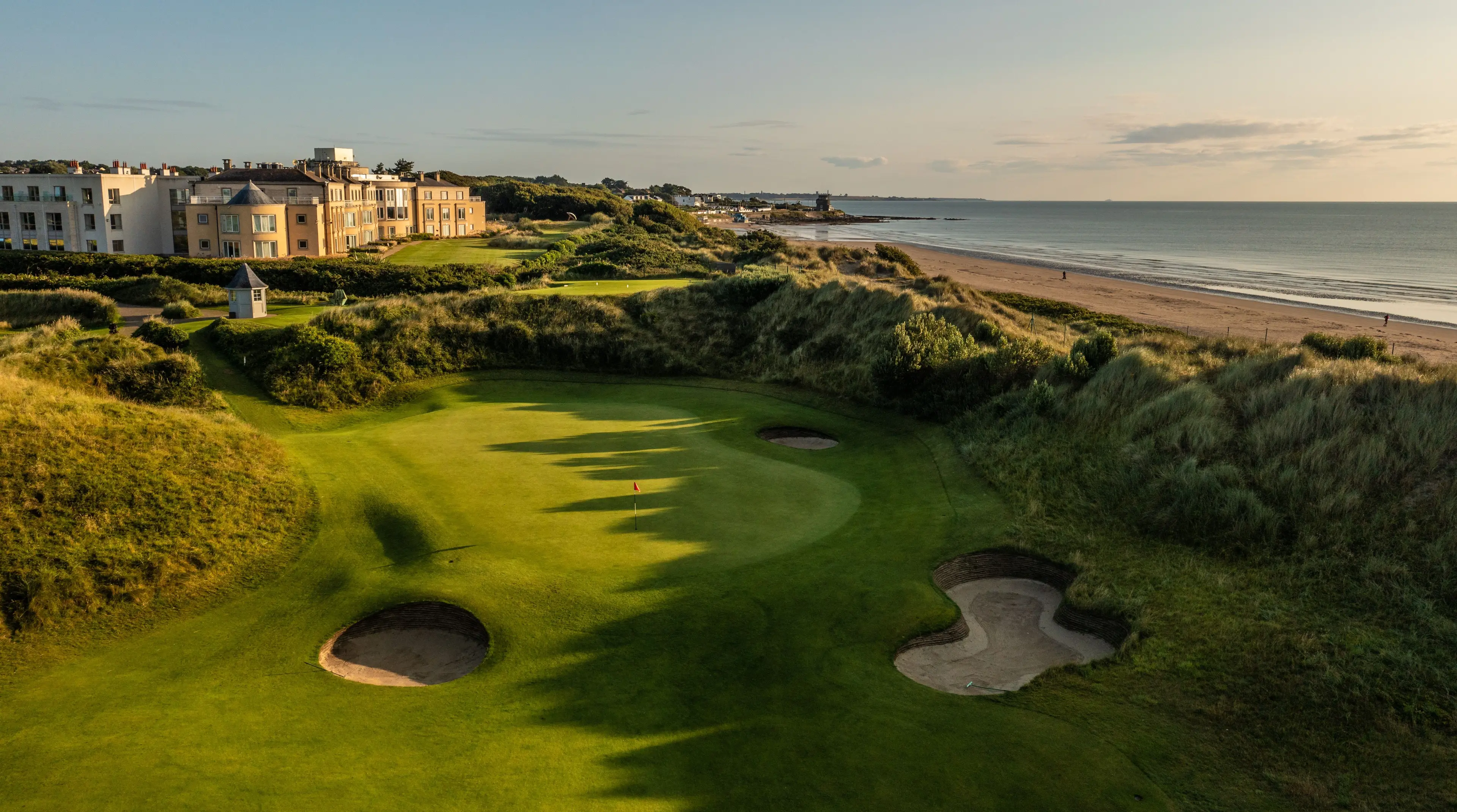 Overhead view of the Portmarnock Resort & Jameson Golf Links building overlooking the gold course