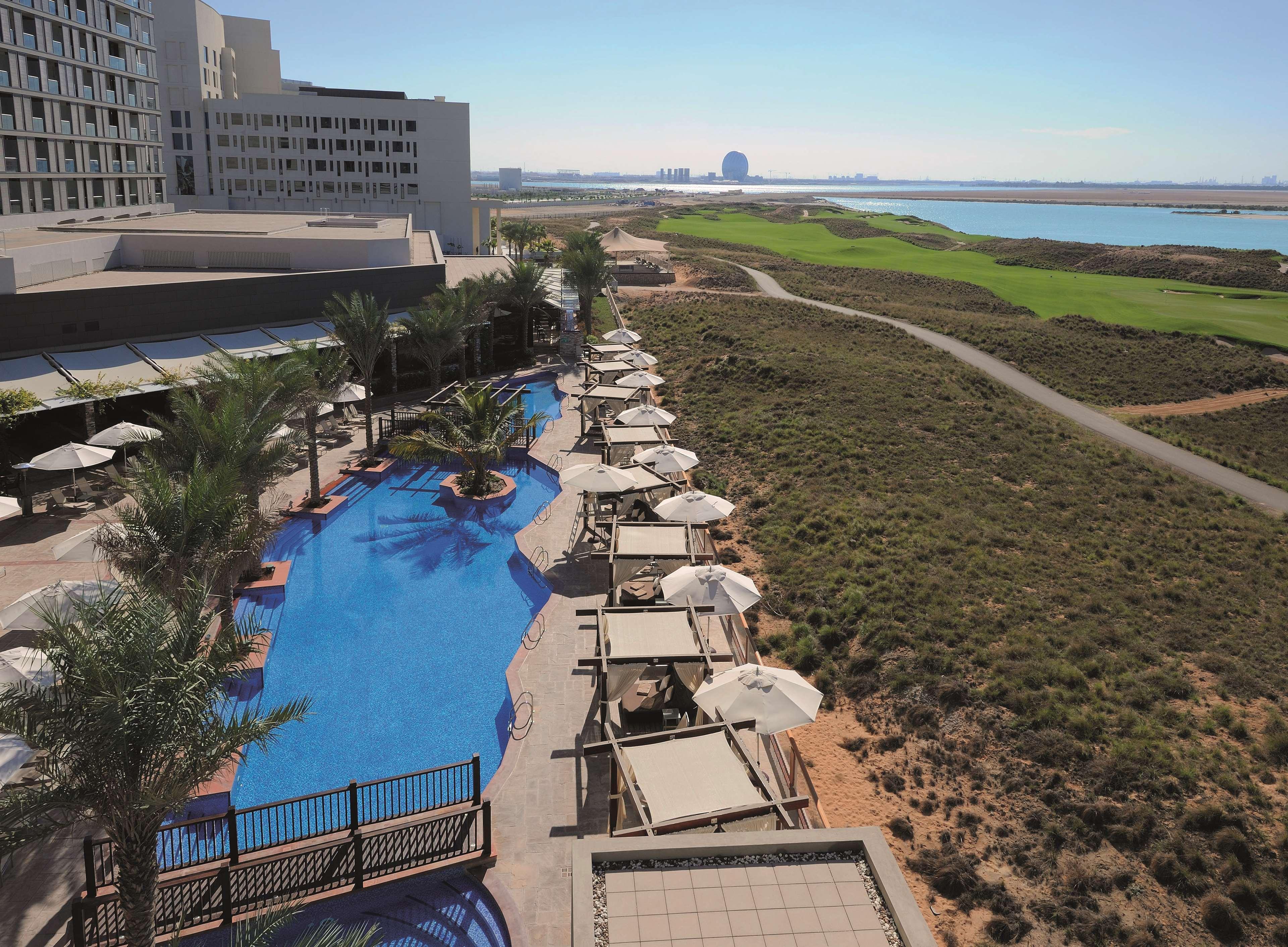 Aerial view of the outdoor swimming pool at Radisson Blu Hotel Abu Dhabi Yas Island