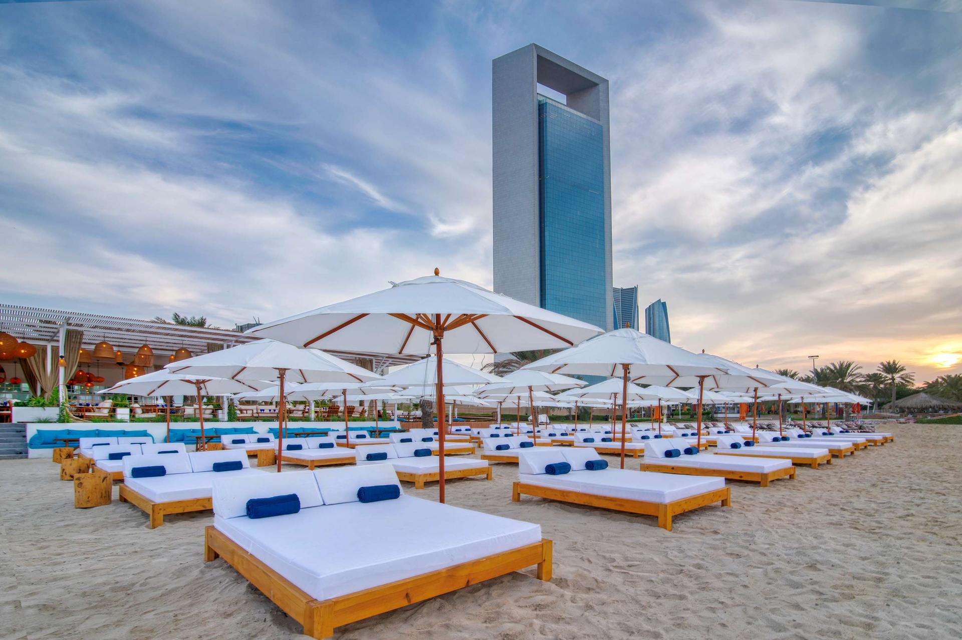 Sunbeds on the private beach at Radisson Blu Hotel, Abu Dhabi Yas Island