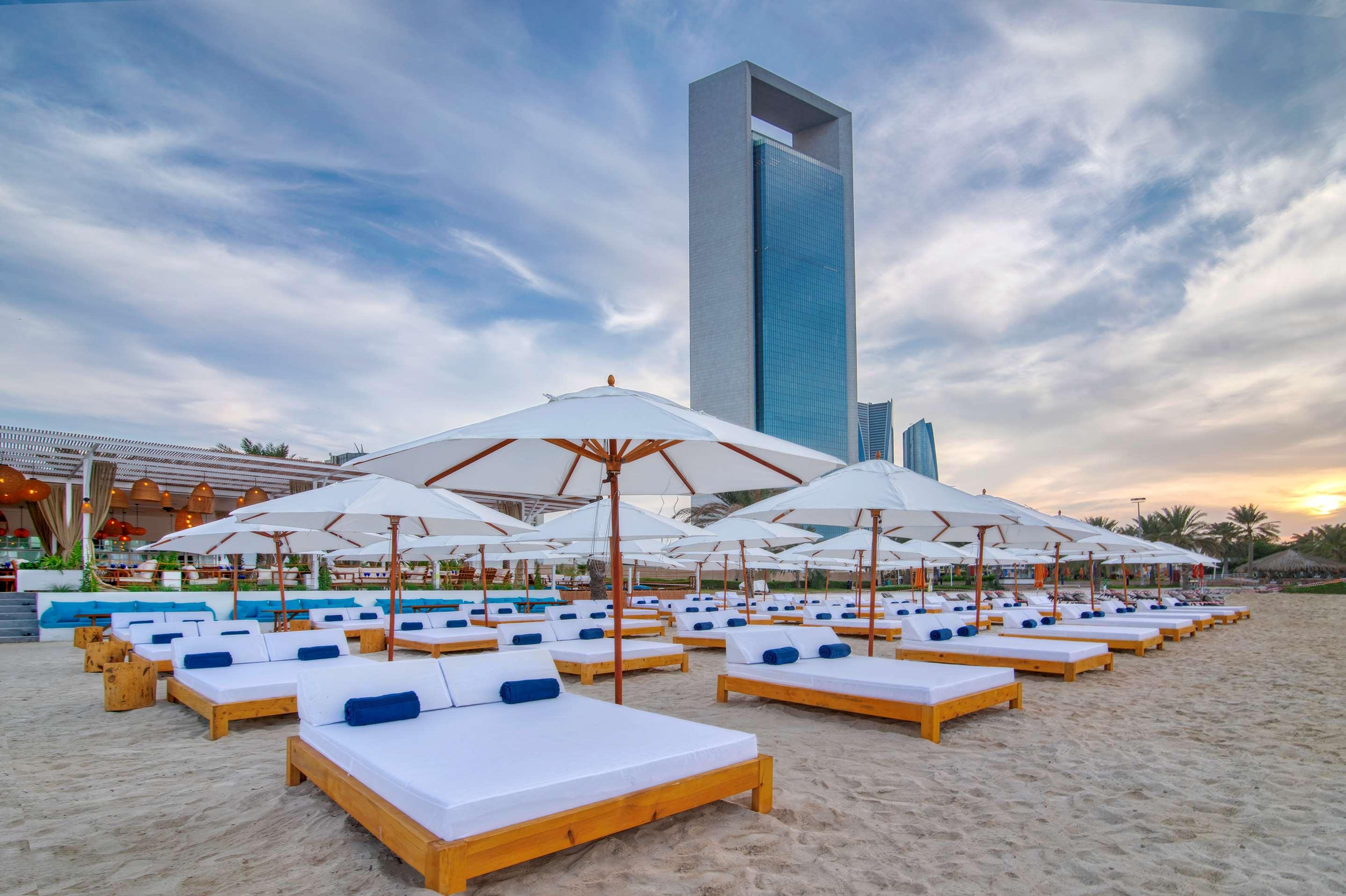 Sunbeds on the private beach at Radisson Blu Hotel, Abu Dhabi Yas Island