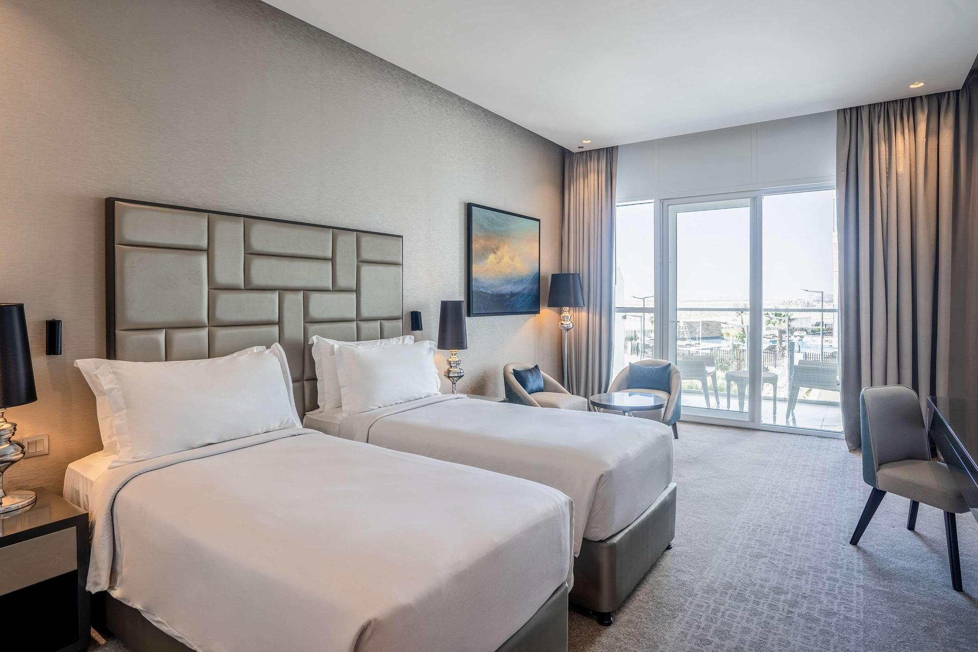 Twin bed room at the Radisson Dubai Damac Hills