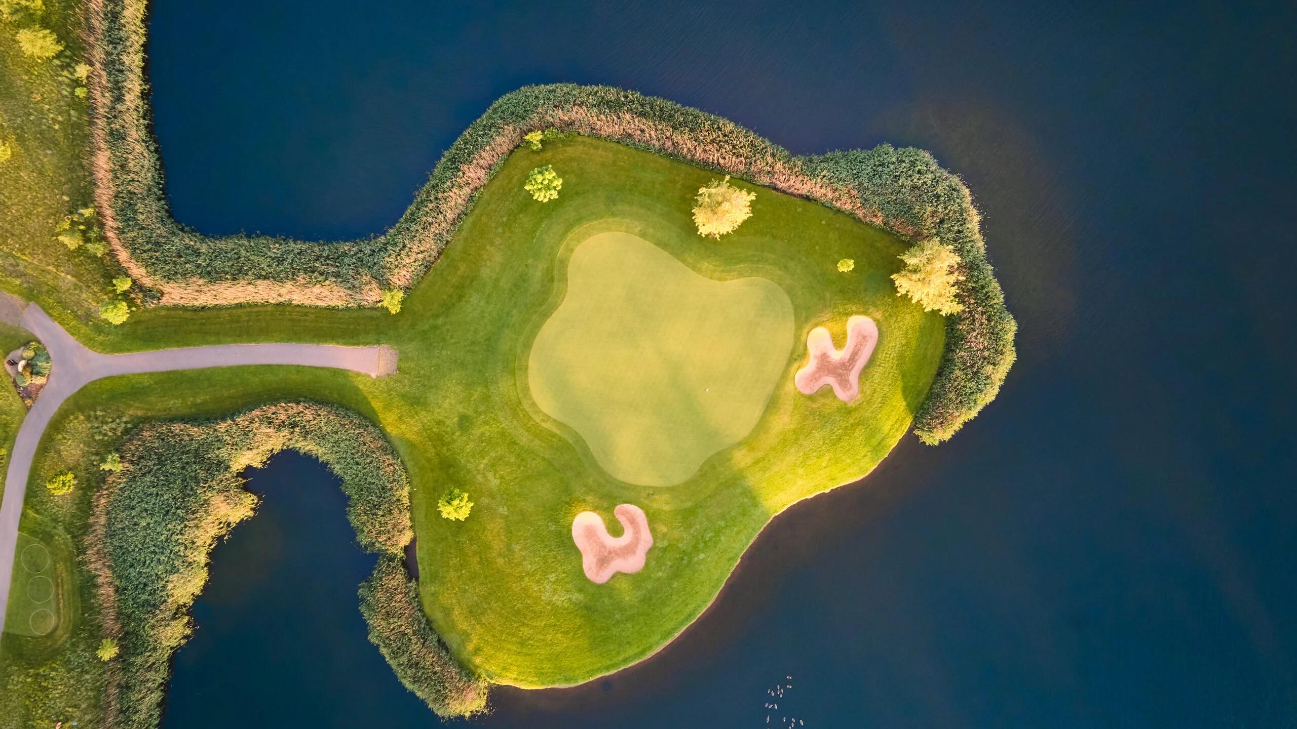 Birdseye view of an island green with sand bunkers at the Rockliffe Hall Hotel Golf & Spa 5*